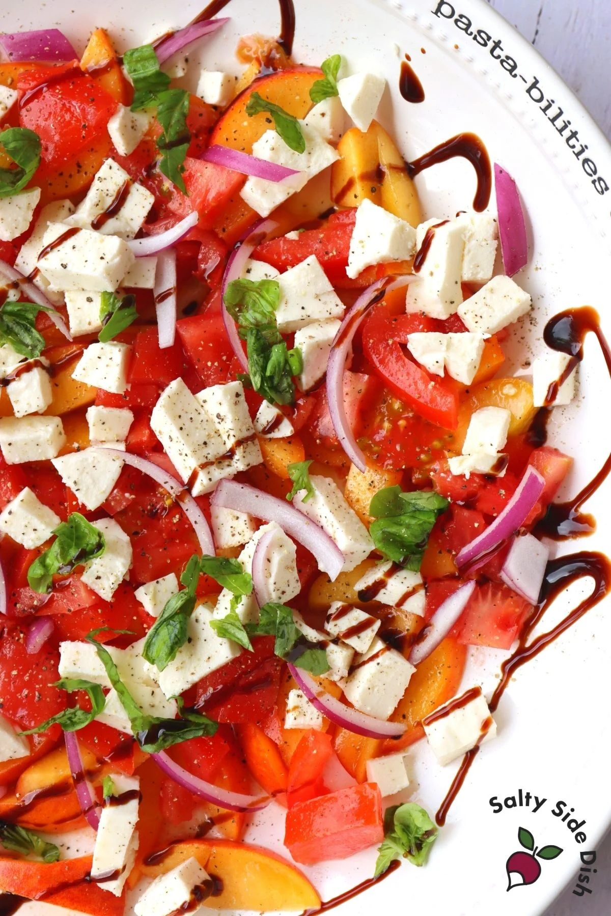 peach caprese salad in a bowl
