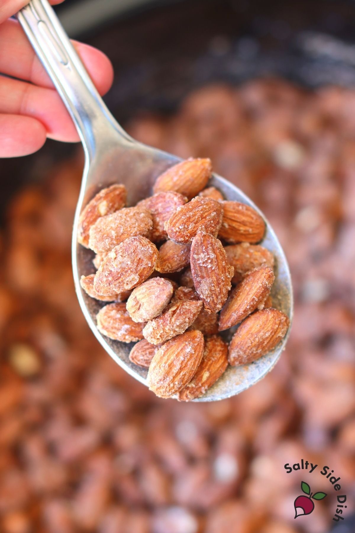 roasted almonds on a spoon