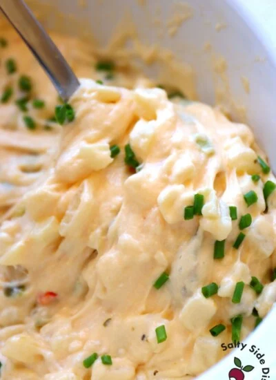 super cheesy potatoes in a slow cooker