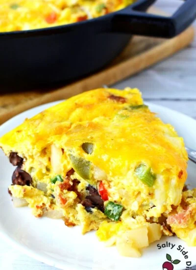 slice of cowboy breakfast casserole on a white plate