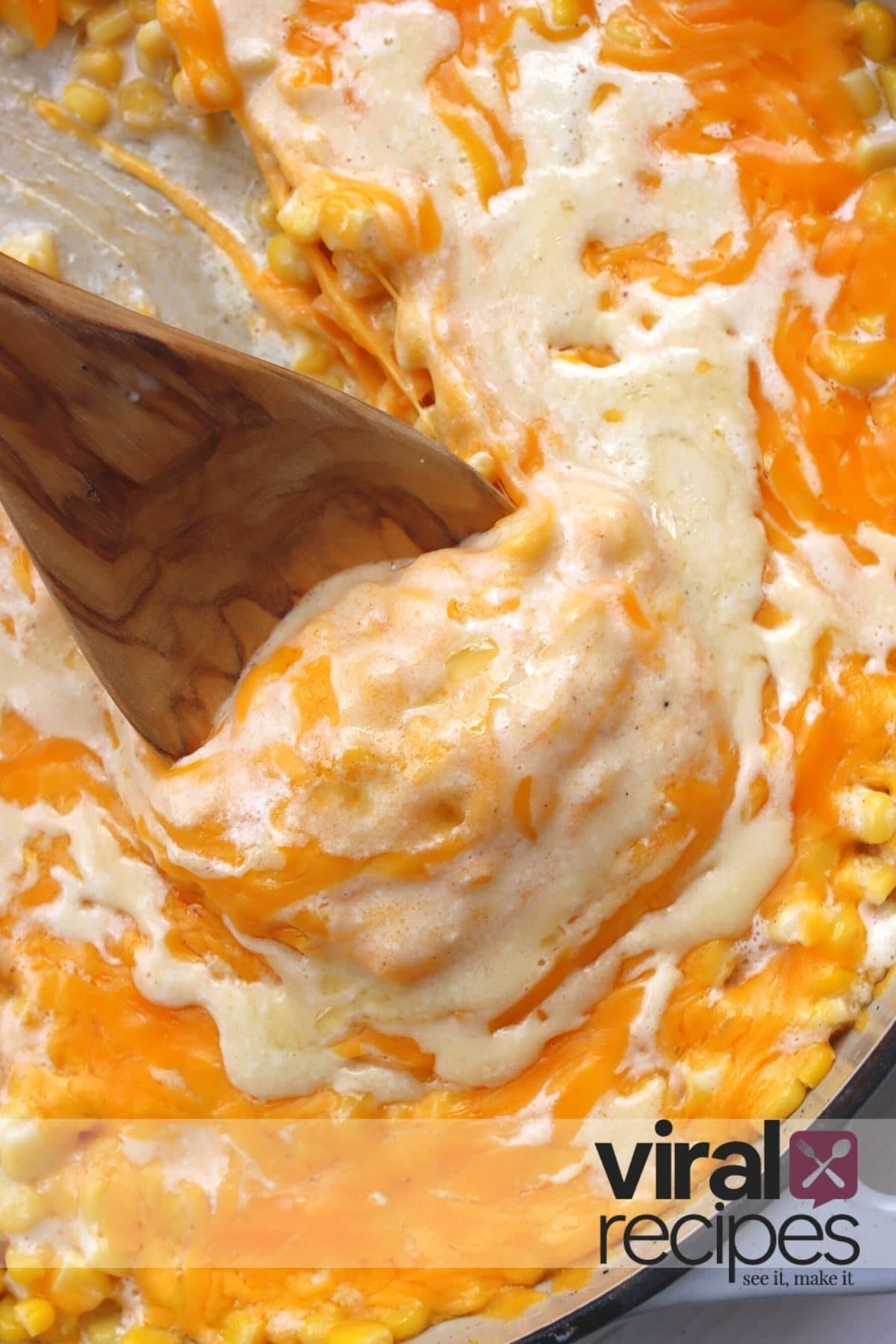 stirring corn cheese