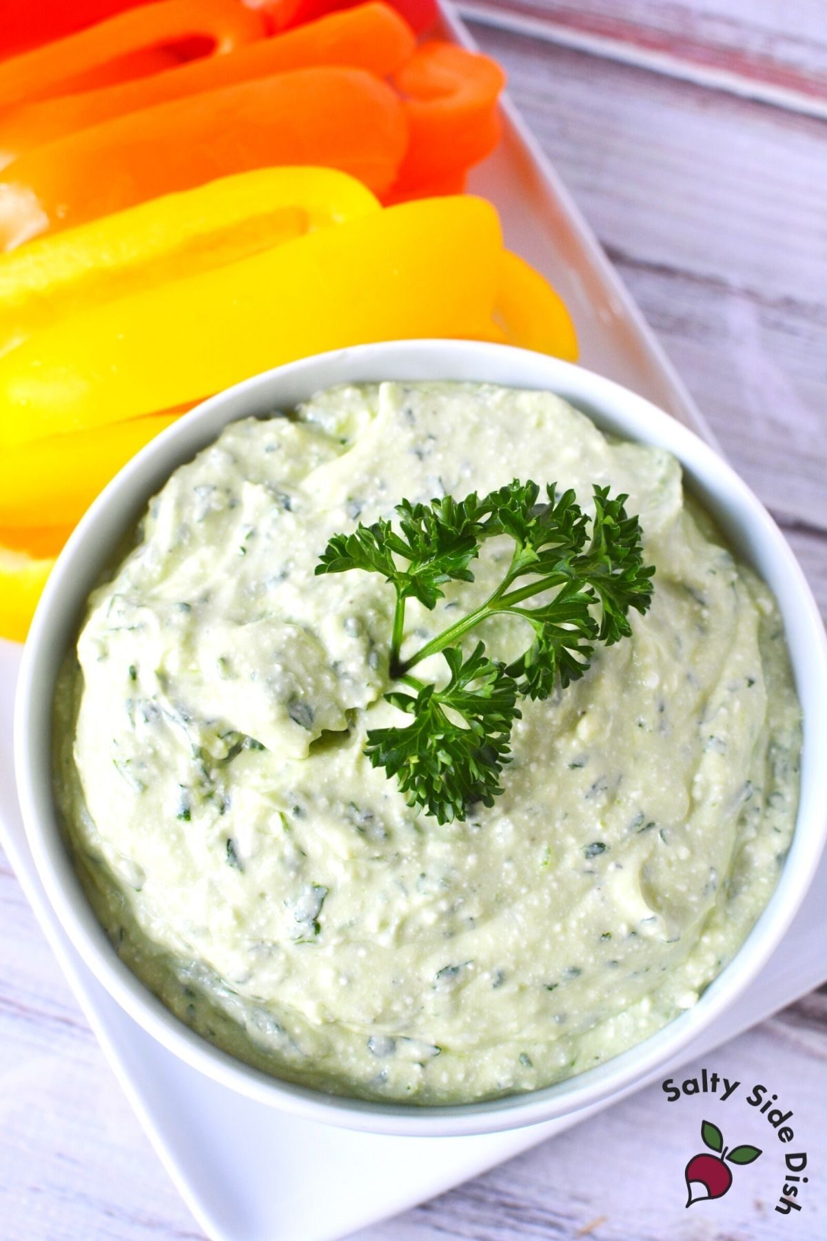 green goddess dip in a bowl with peppers