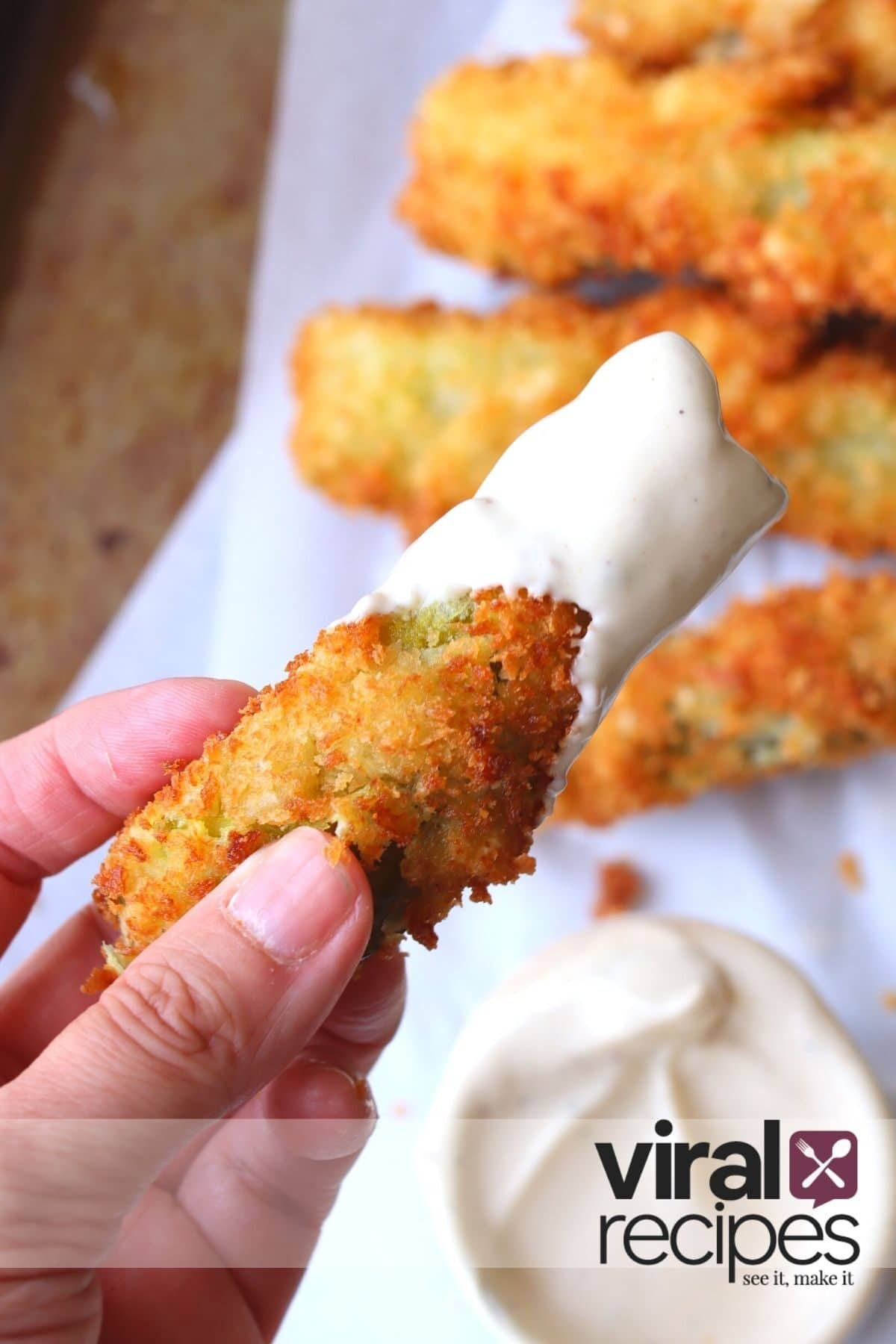 Fried pickles served with a side of ranch dip.