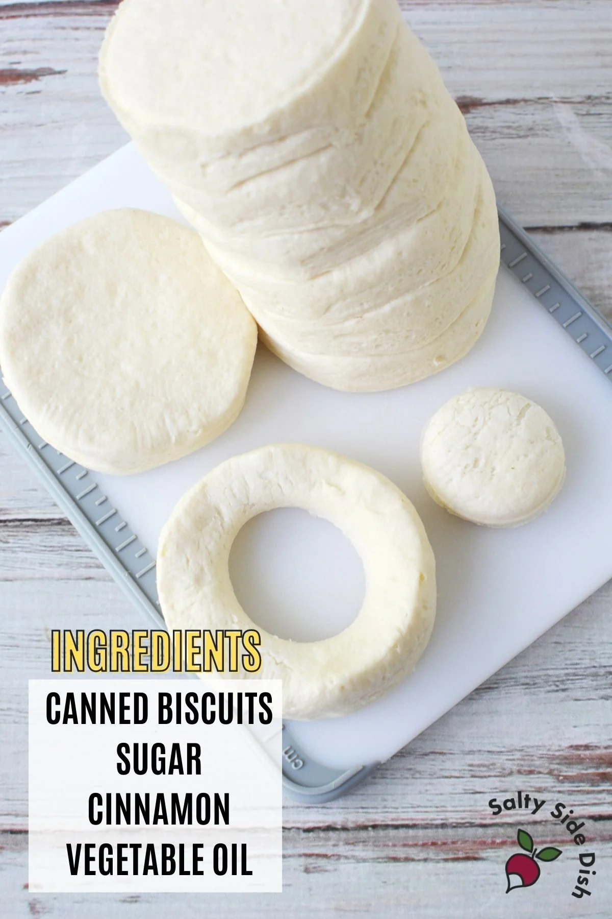 biscuits sitting on a cutting board with ingredient list on bottom left