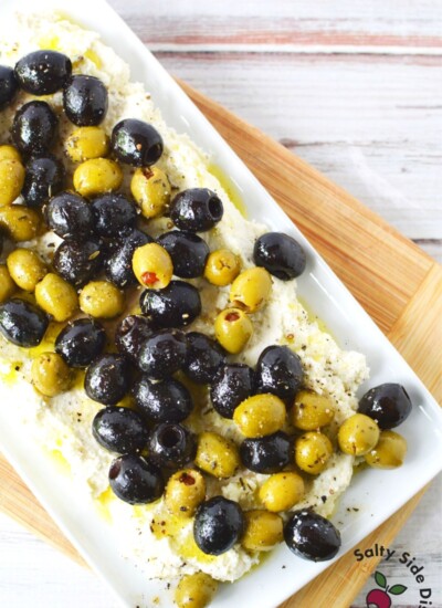 olives and feta dip on a plate