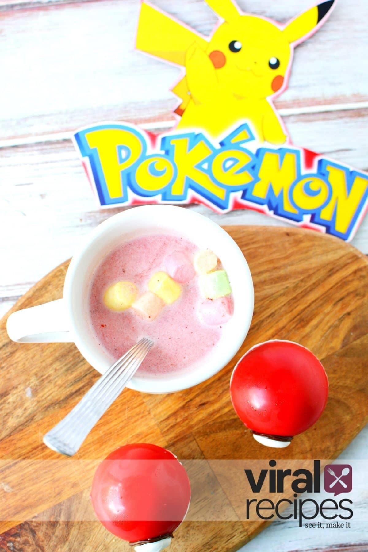 pokeball dropped into a mug with marshmallows