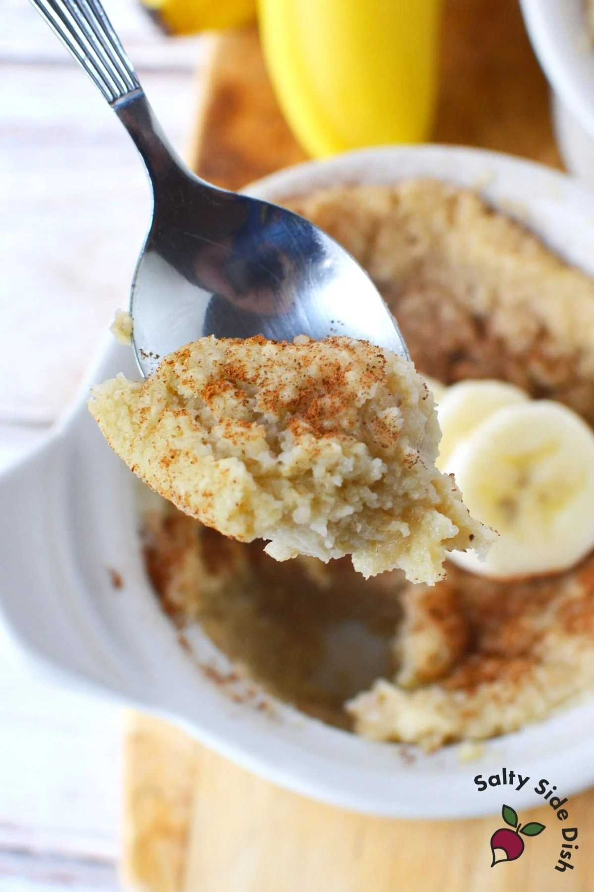 spoon with baked oats on top.