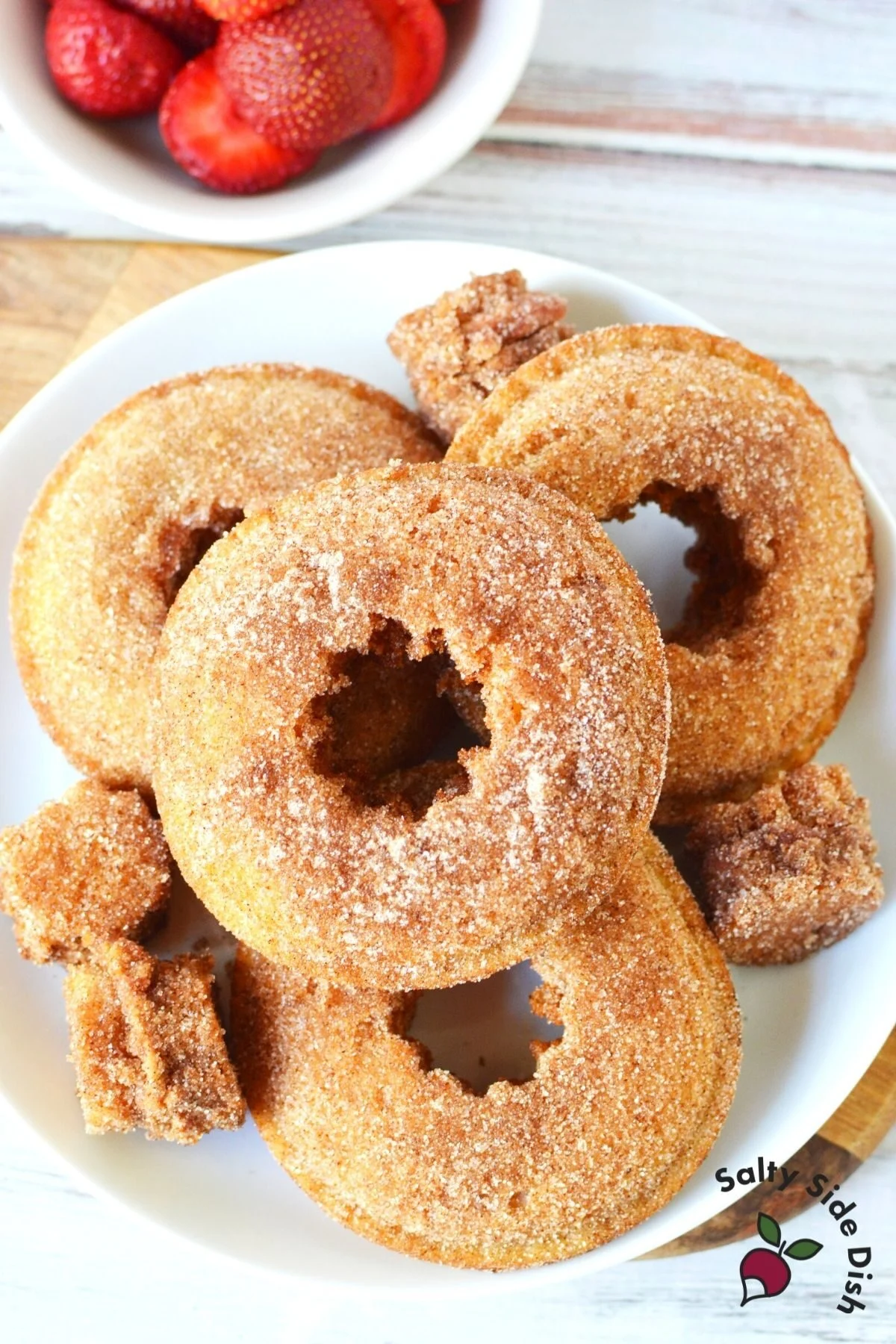 pile of fried uncrustables on a white plate