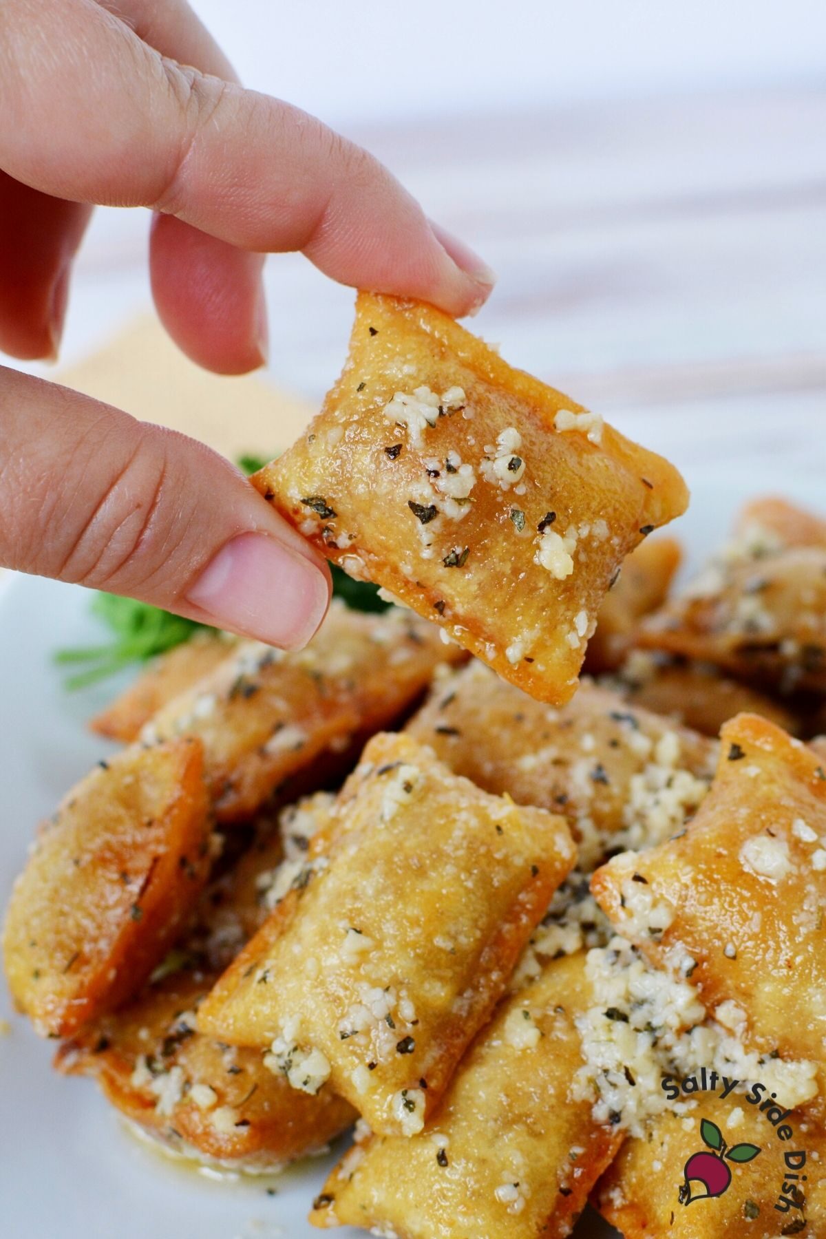 tiktok pizza rolls being held by a hand