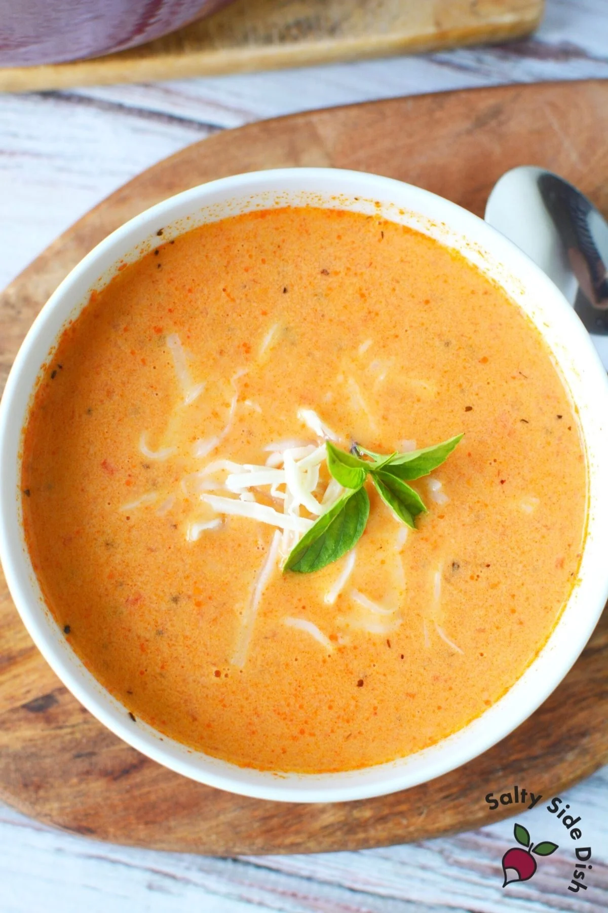 huge white bowl of fresh tomato soup.