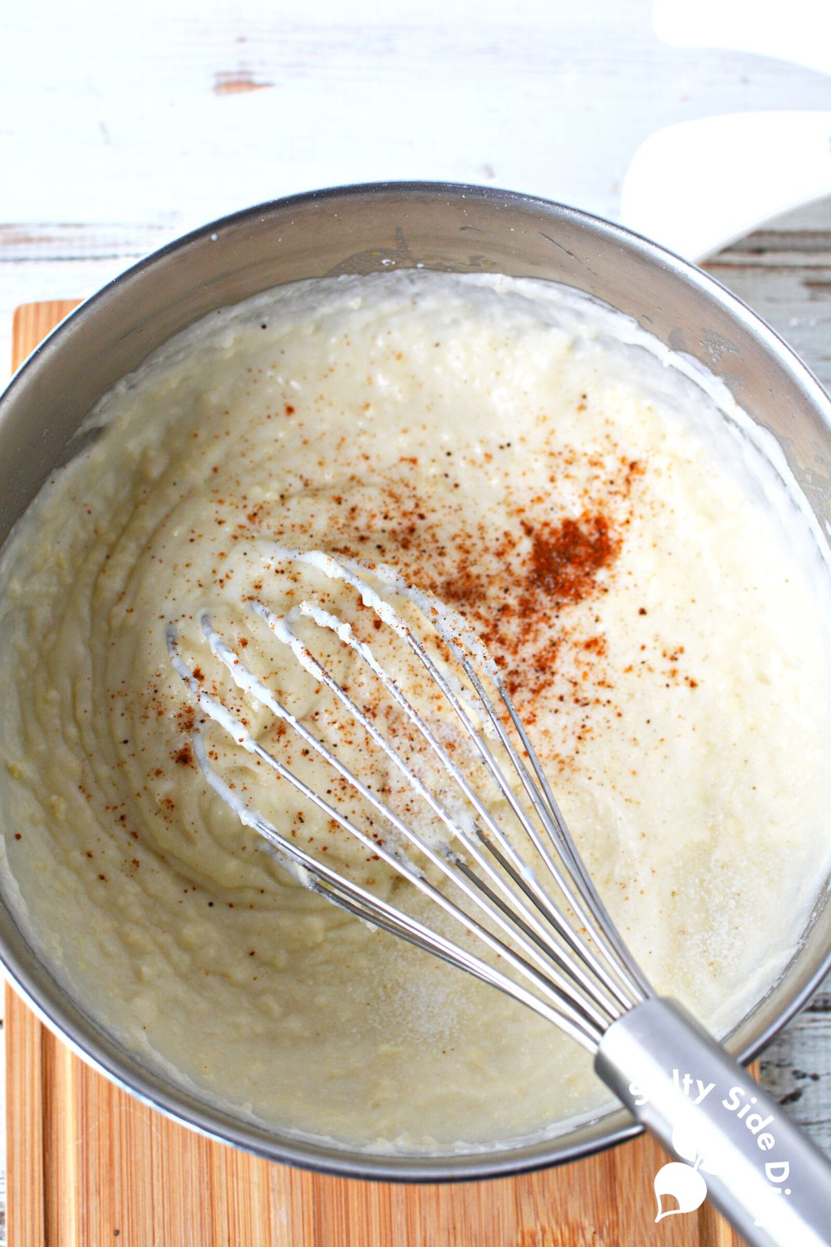 roux ready to be poured from saucepan.