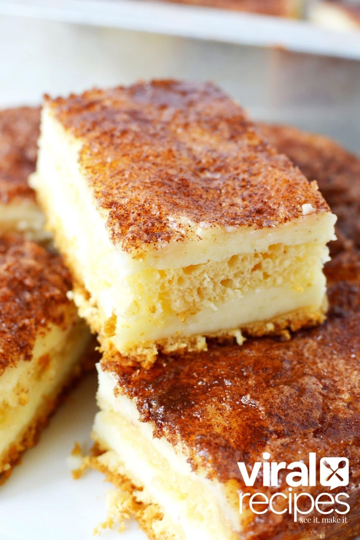 stack of freshly cut sopapilla cheesecake bars closeup.