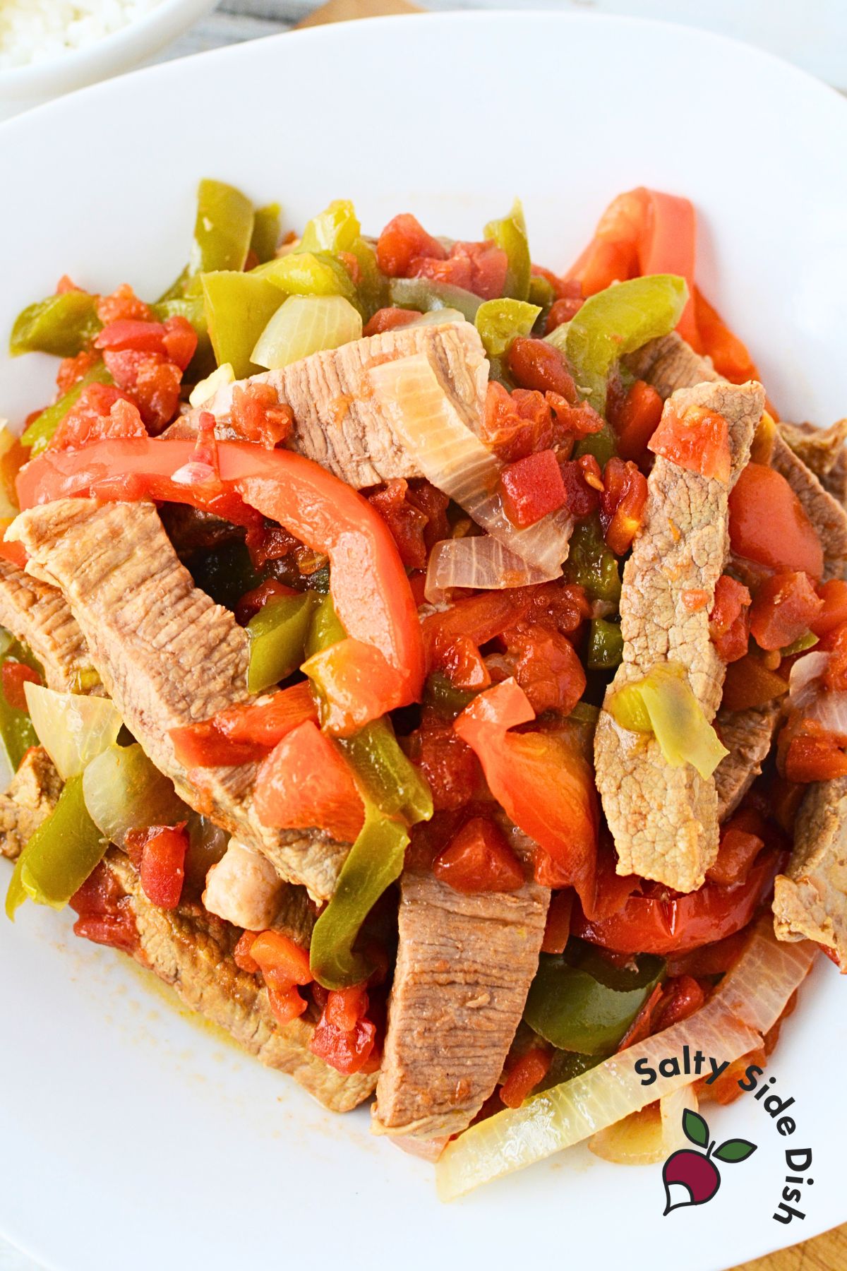 bell peppers and onions in a slow cooker.
