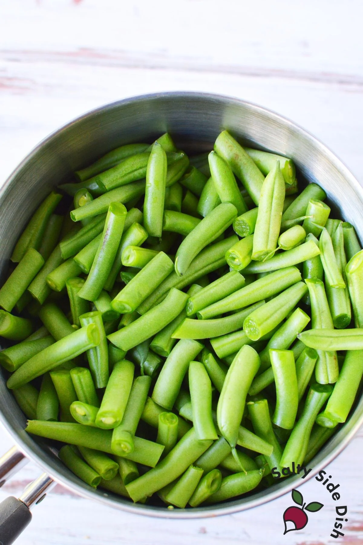 fresh green beans in a pot.