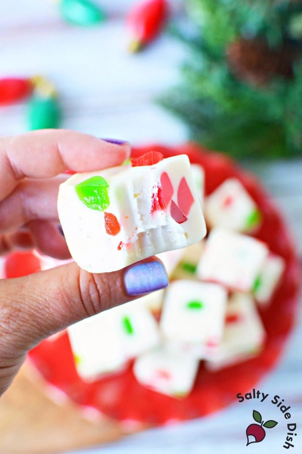 biting into a nougat candy.