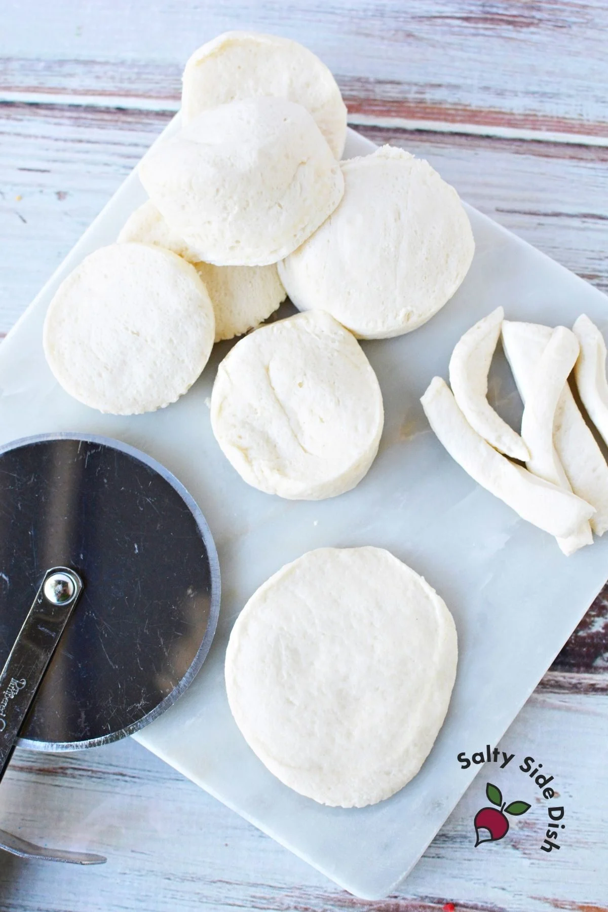 flatten out and cut biscuits.