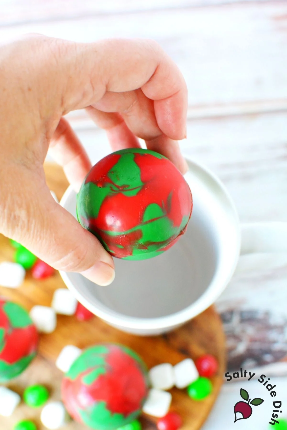 swirly red and green chocolate bomb.