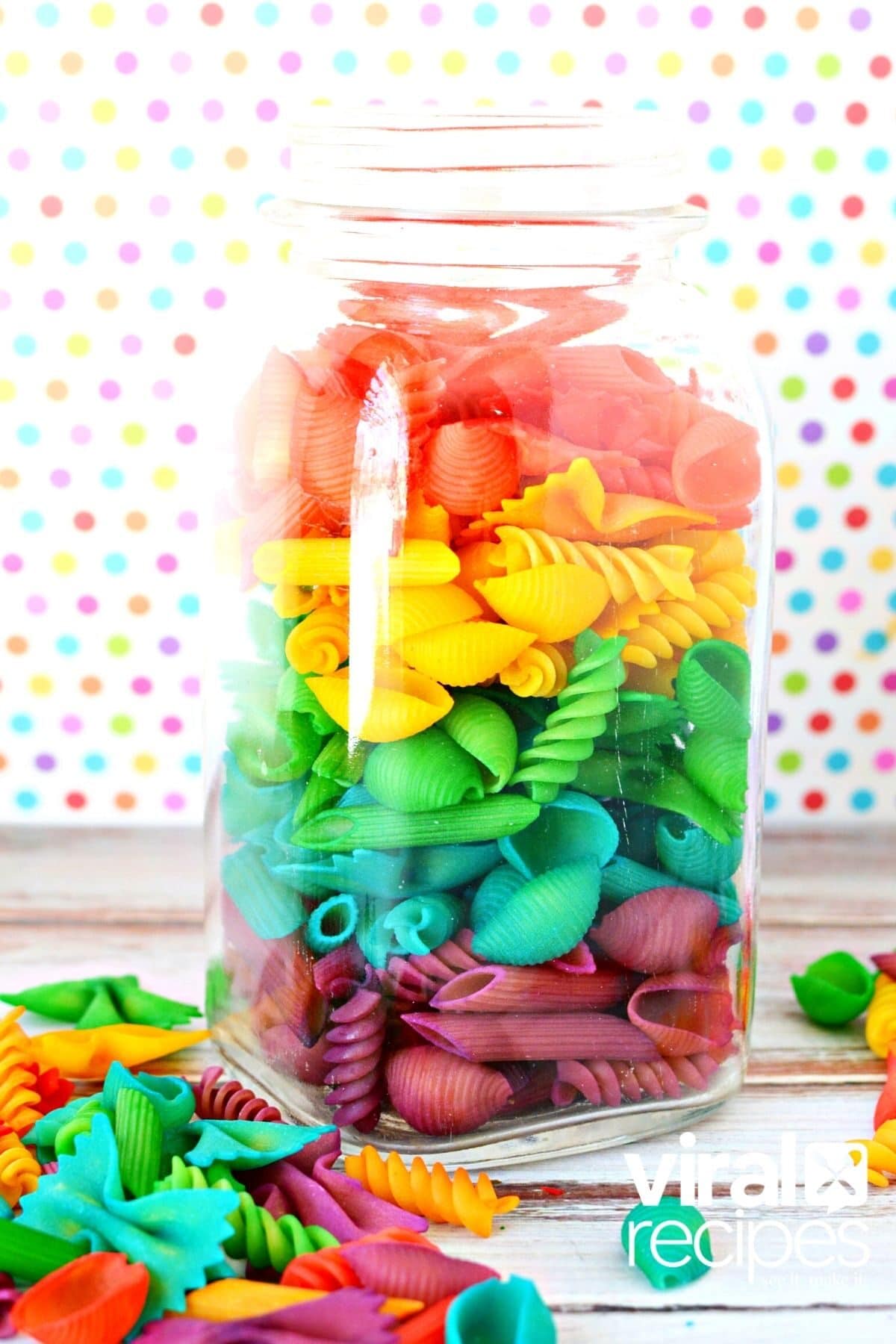 colored pasta in a mason jar.