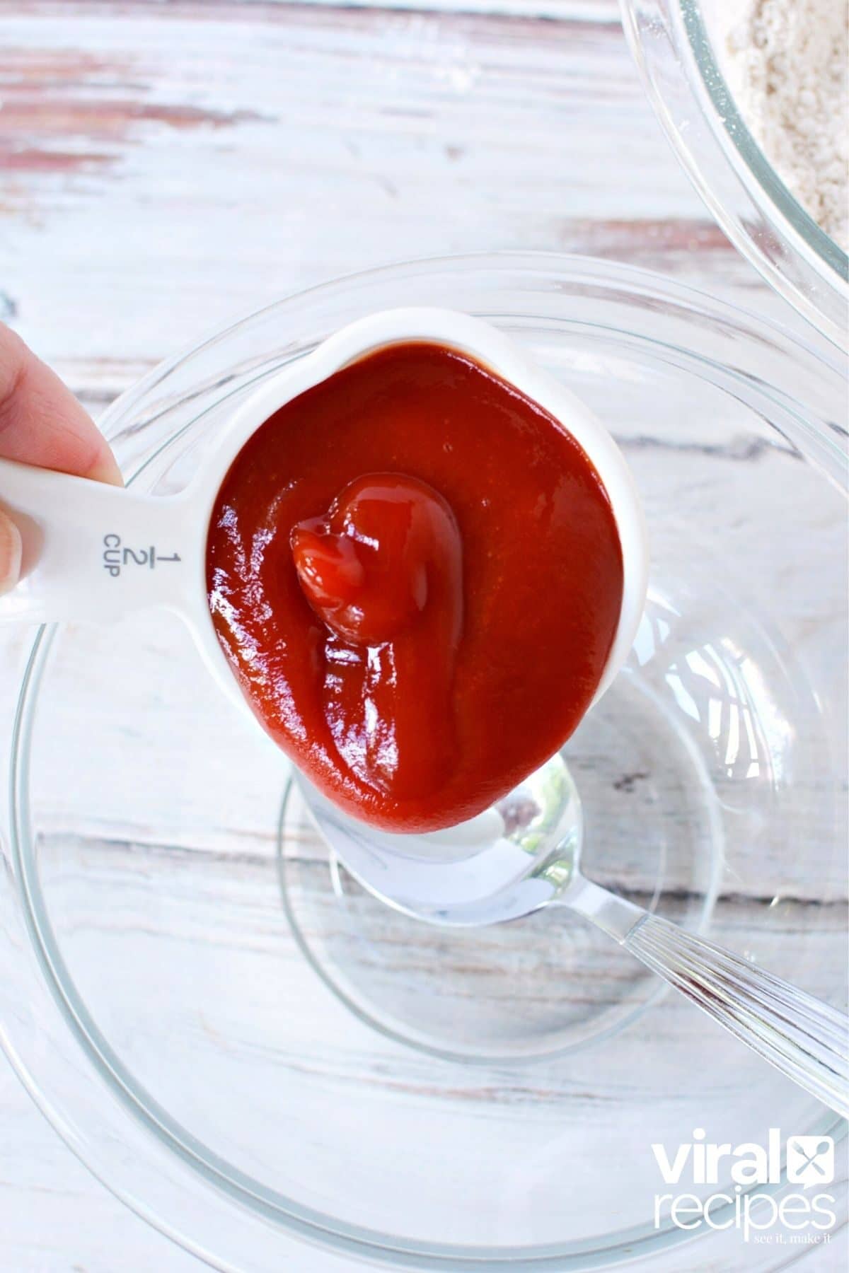 cup full of ketchup.
