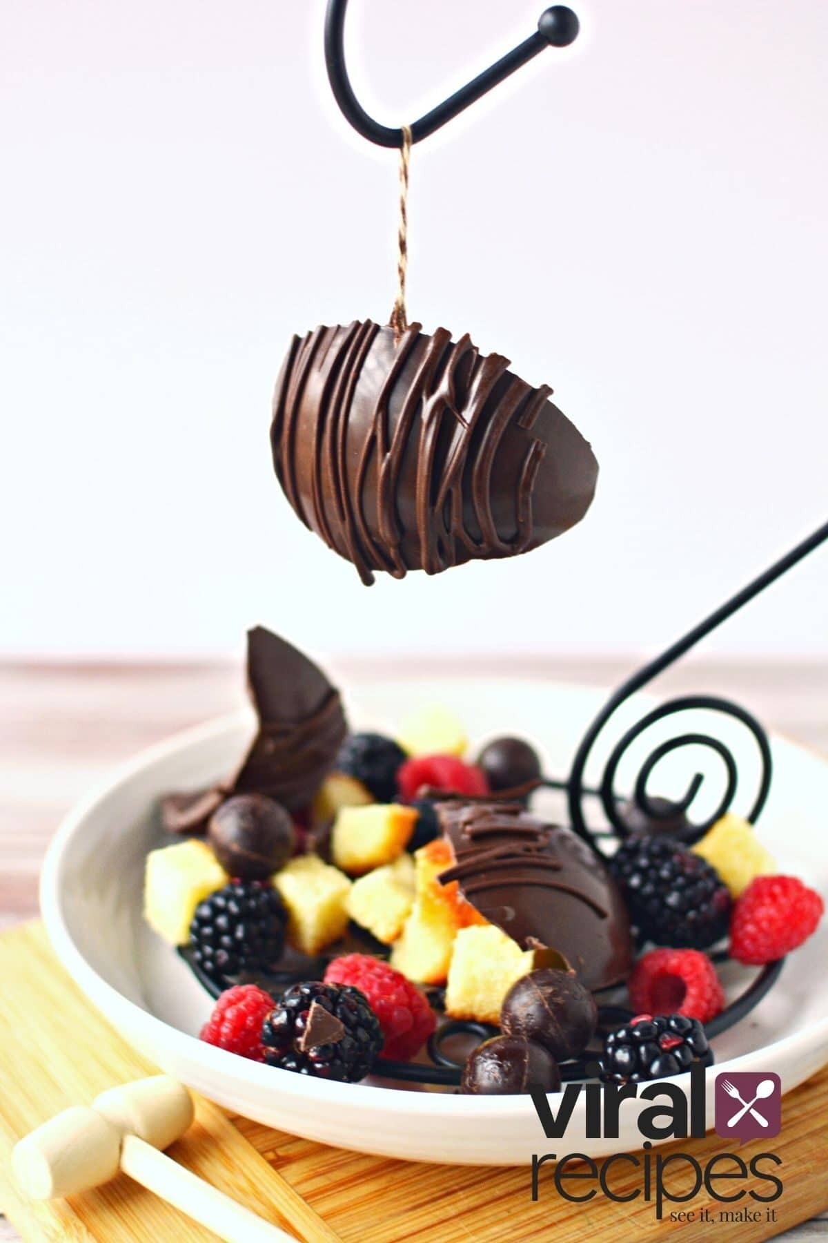chocolate pinata hanging that is smashed.