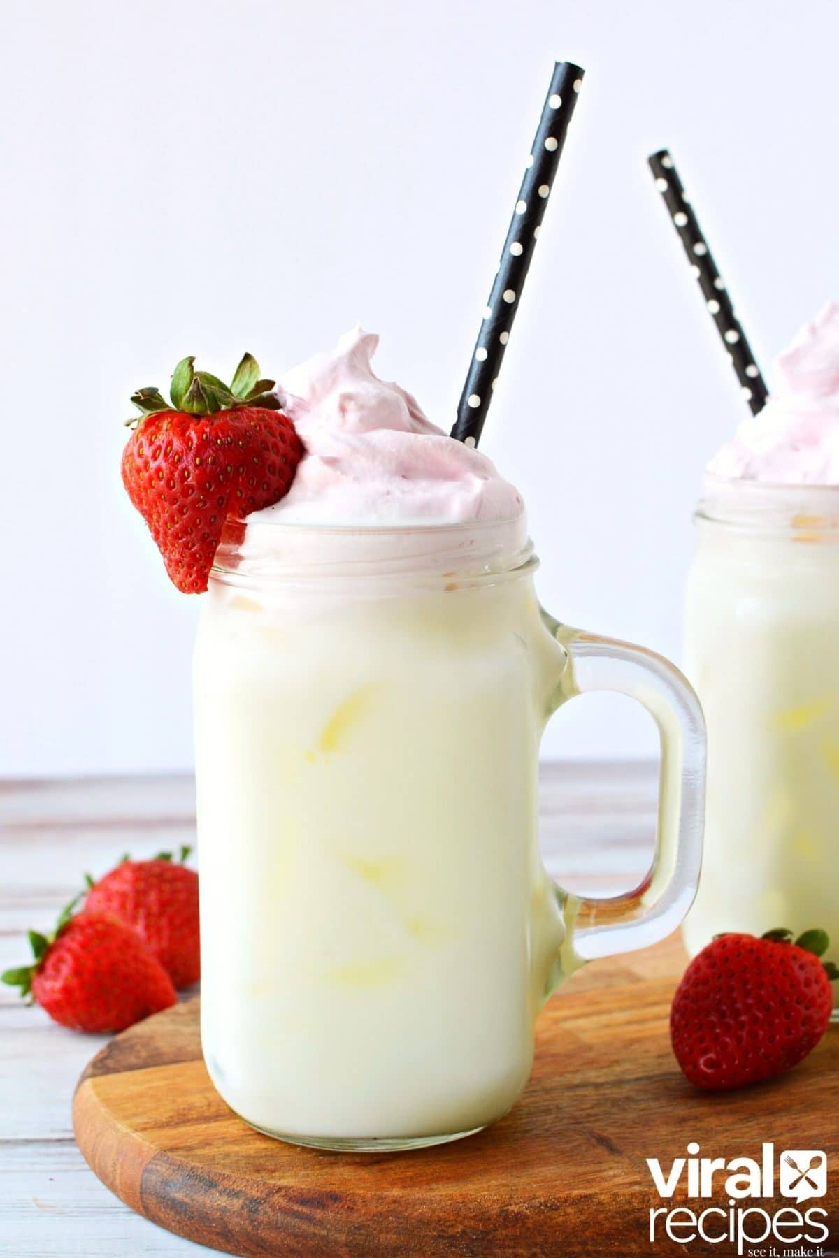 whipped strawberry milk in a mason jar.