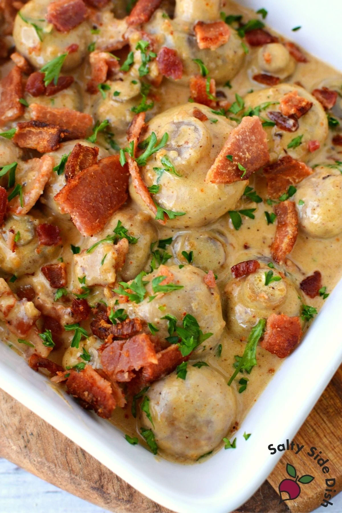 white bowl of large garlic mushrooms.