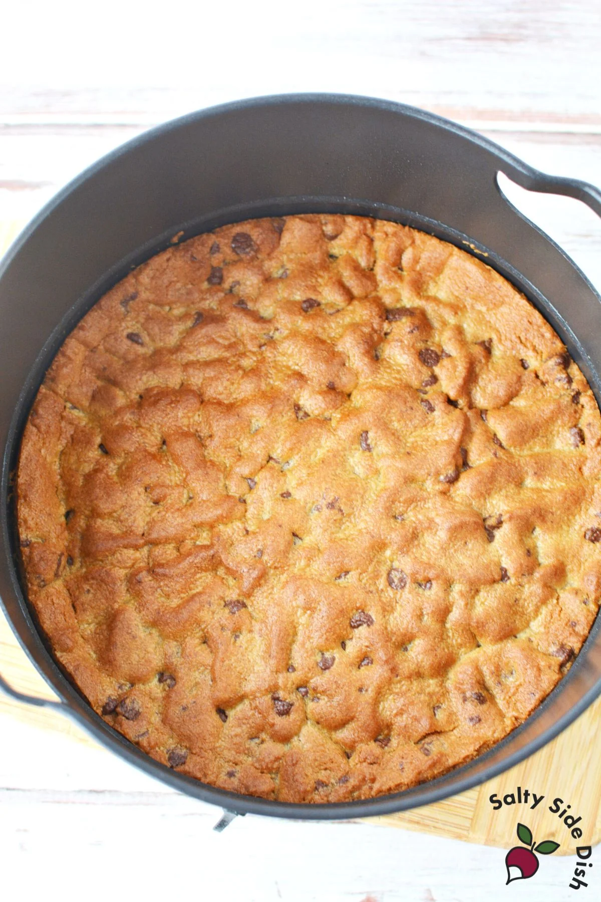 cookie dough baked in bottom of air fryer basket.