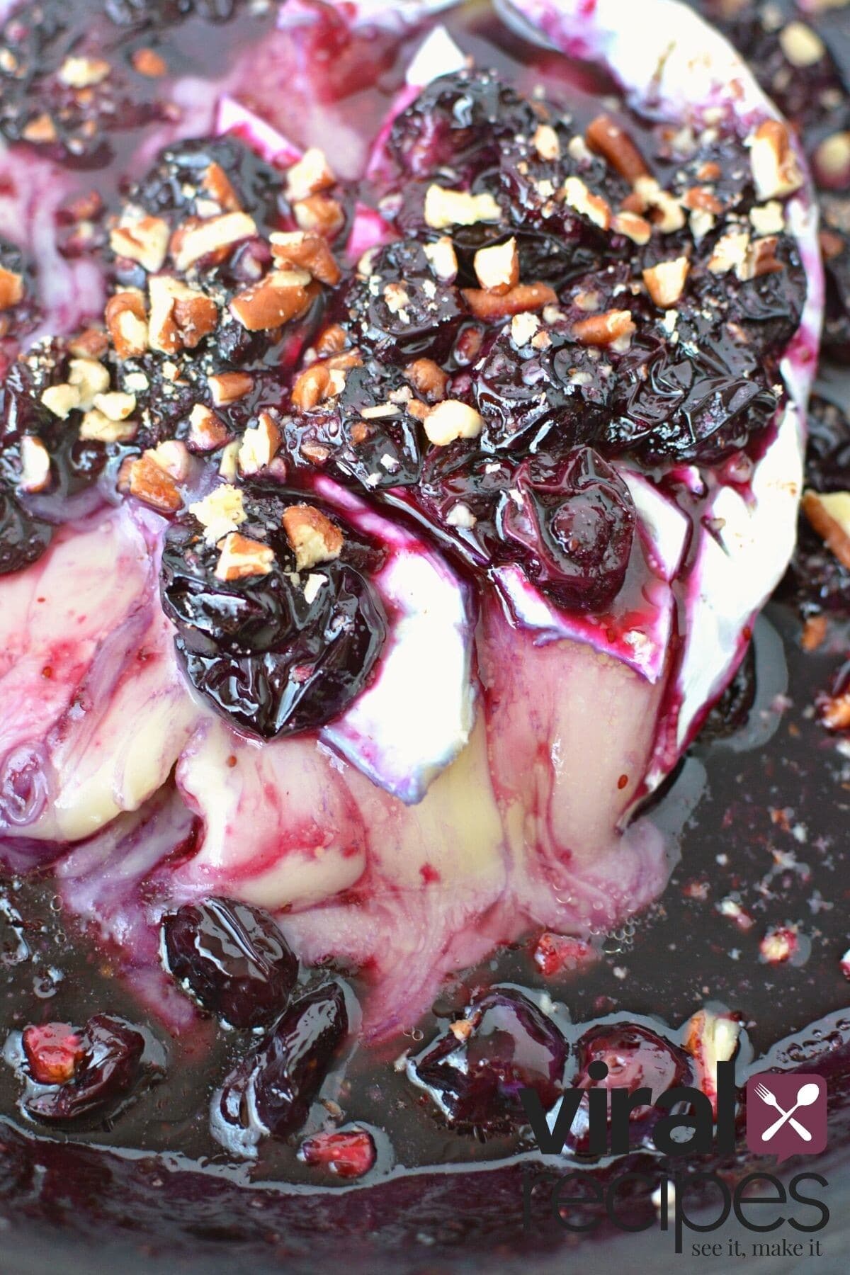 baked brie with blueberries.