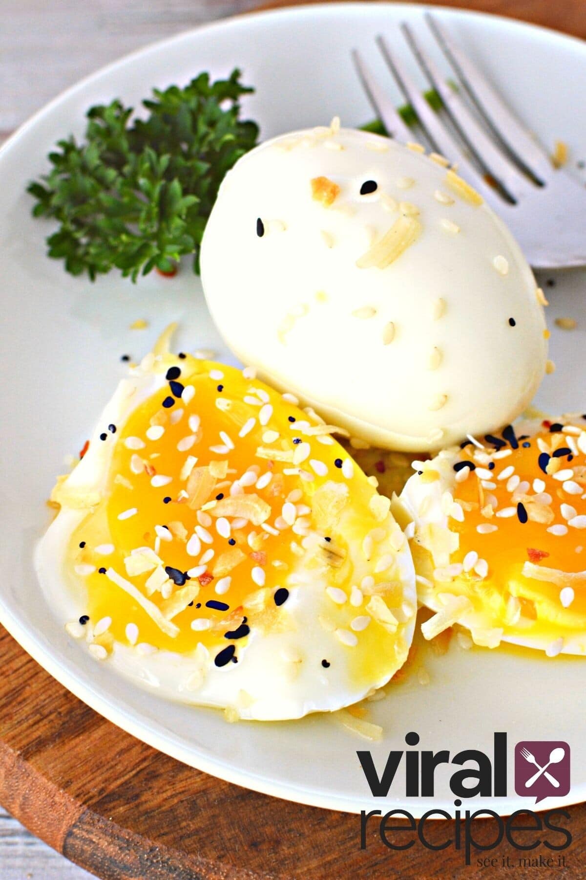 cut into jammy egg halves on a plate.