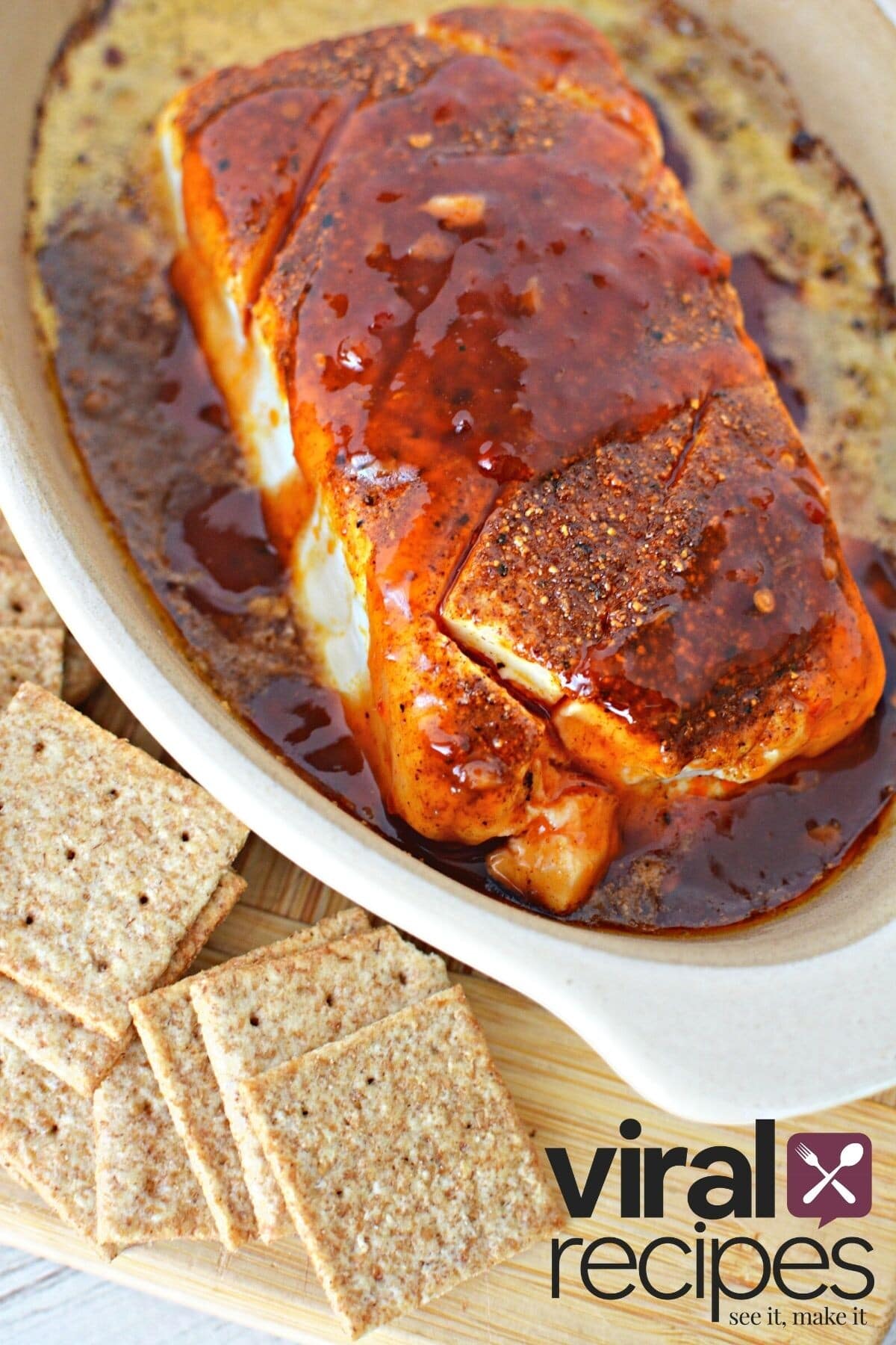 smoked cream cheese recipe in a dish with crackers.