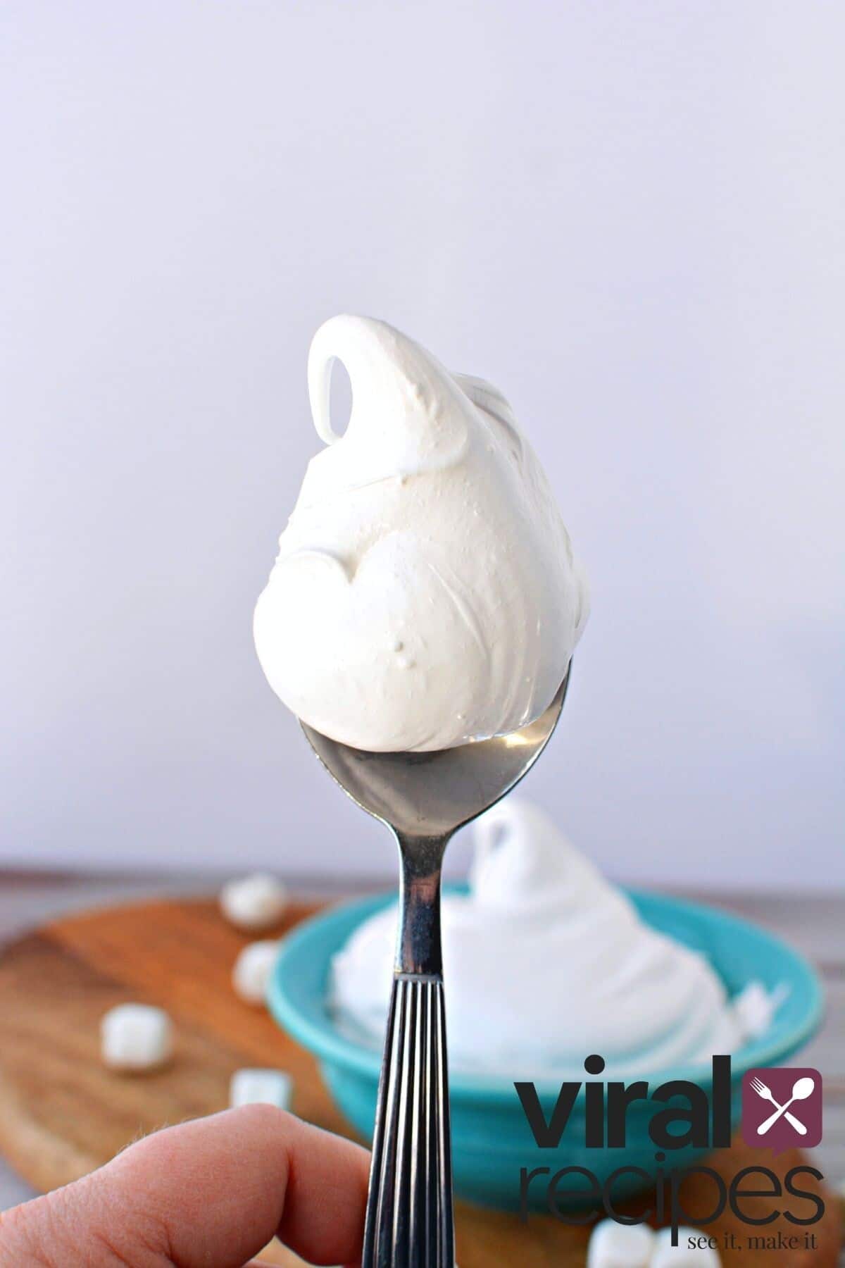 marshmallow fluff on a spoon.