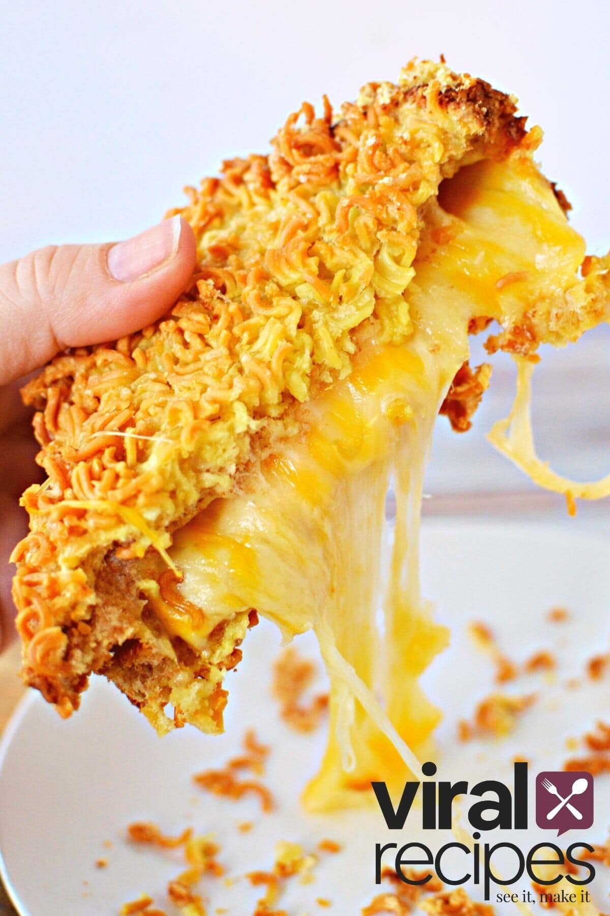 eating a ramen grilled cheese sandwich.