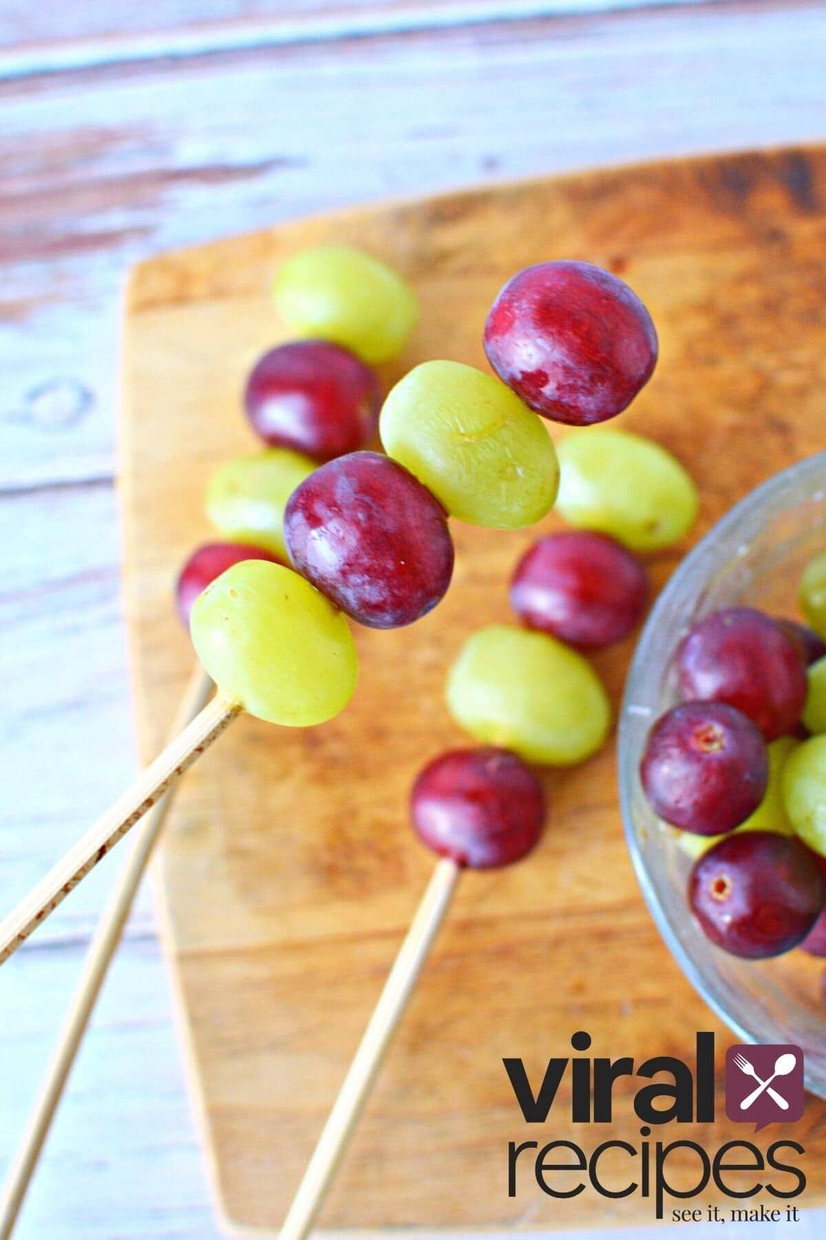 grapes on a bamboo skewer.