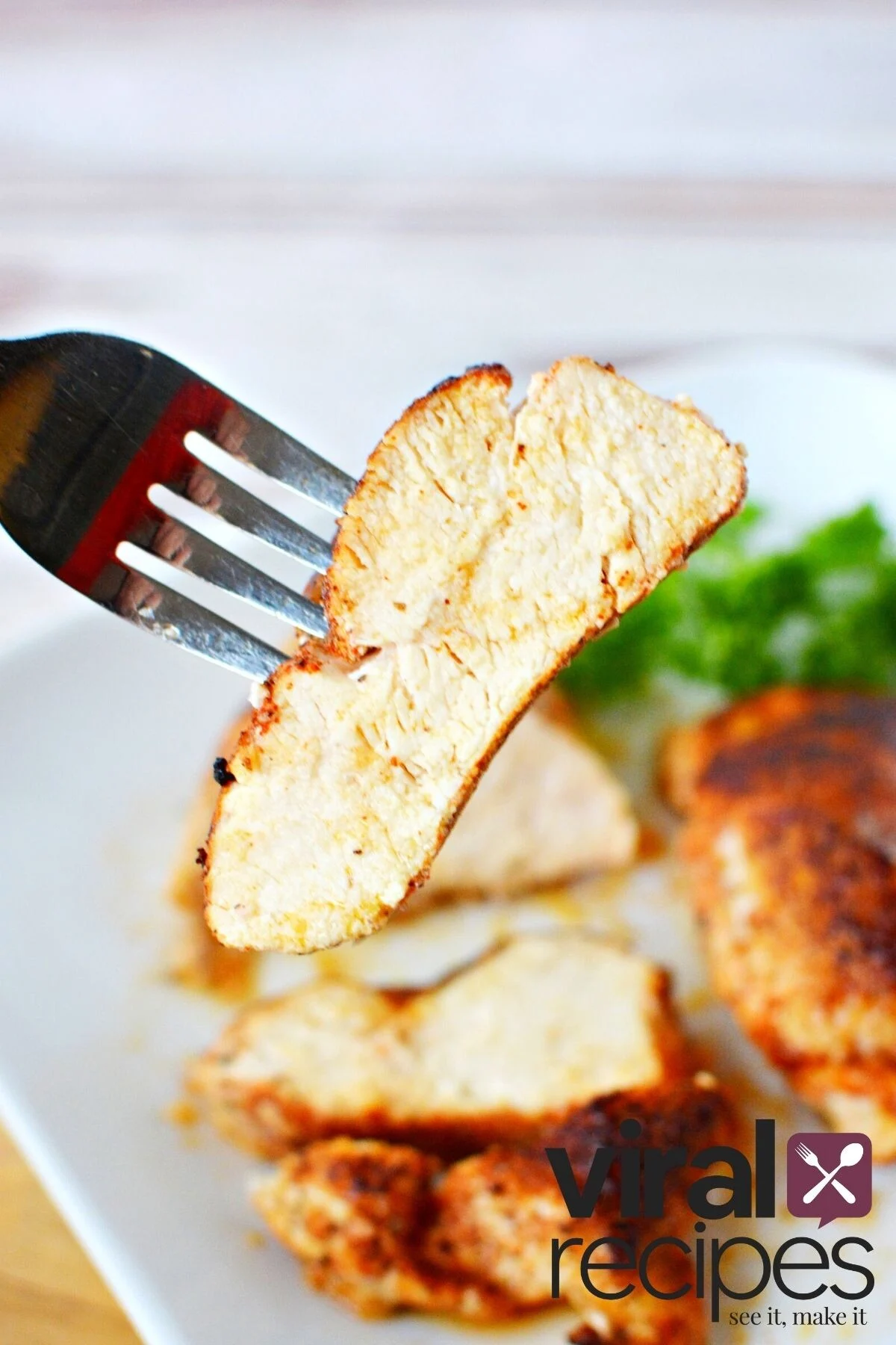 chicken piece on a fork.