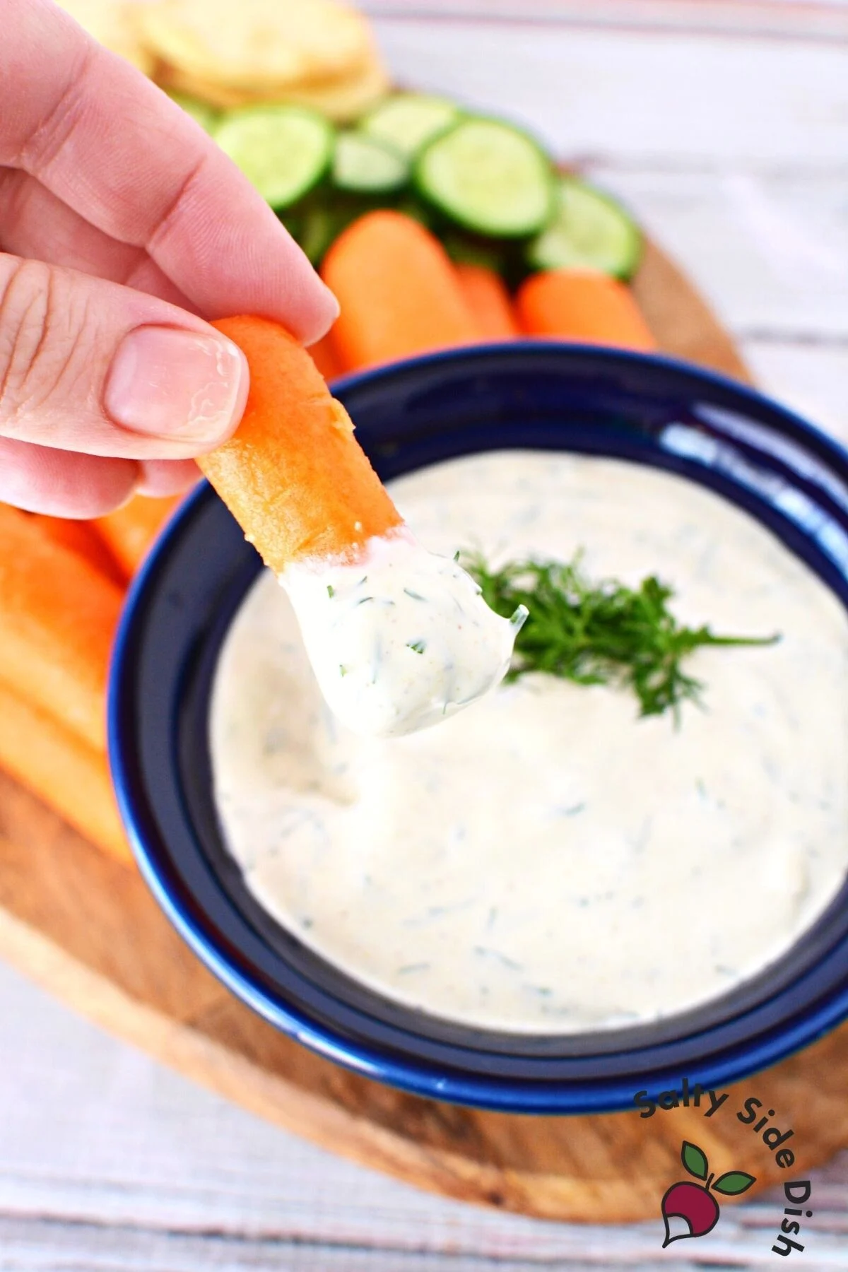 carrot in a dip bowl.