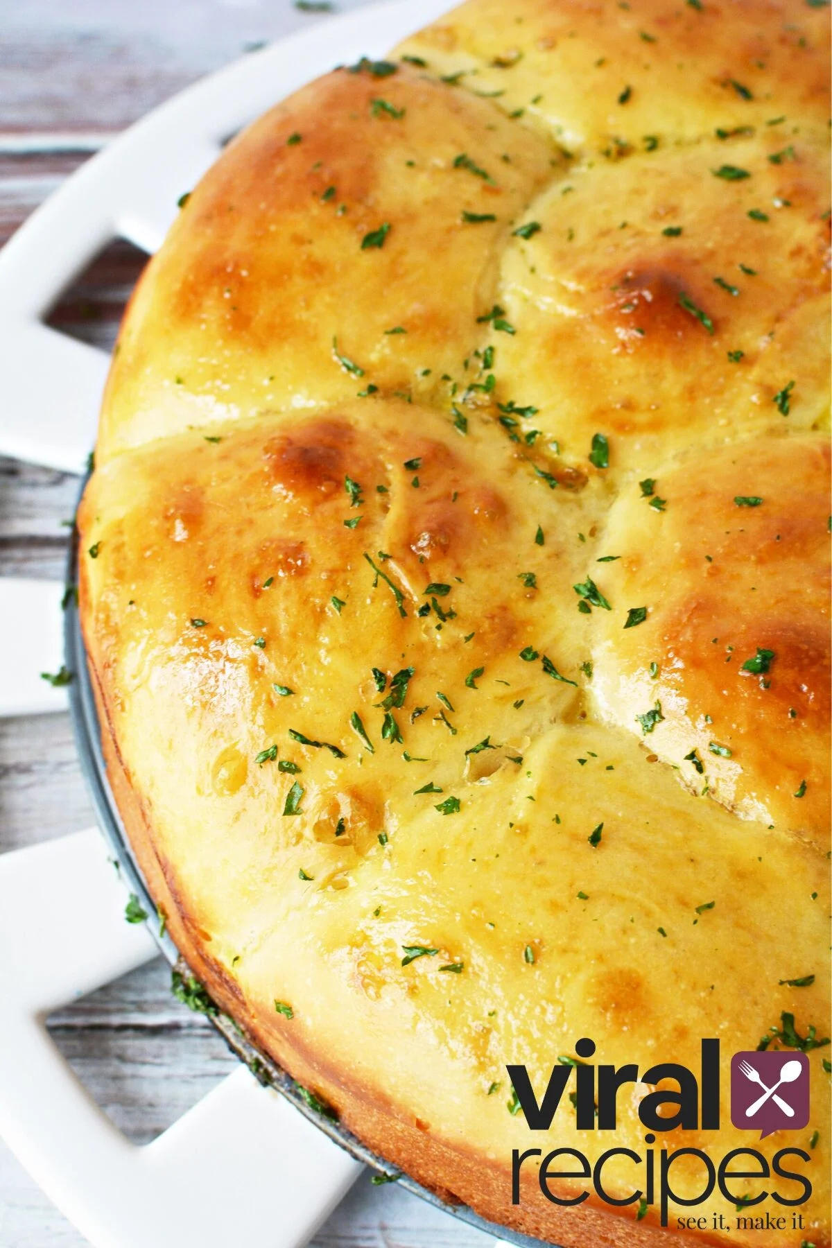 golden brown milk bread in a dish.