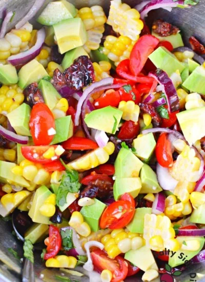 corn salad recipe with red onions and tomatoes.