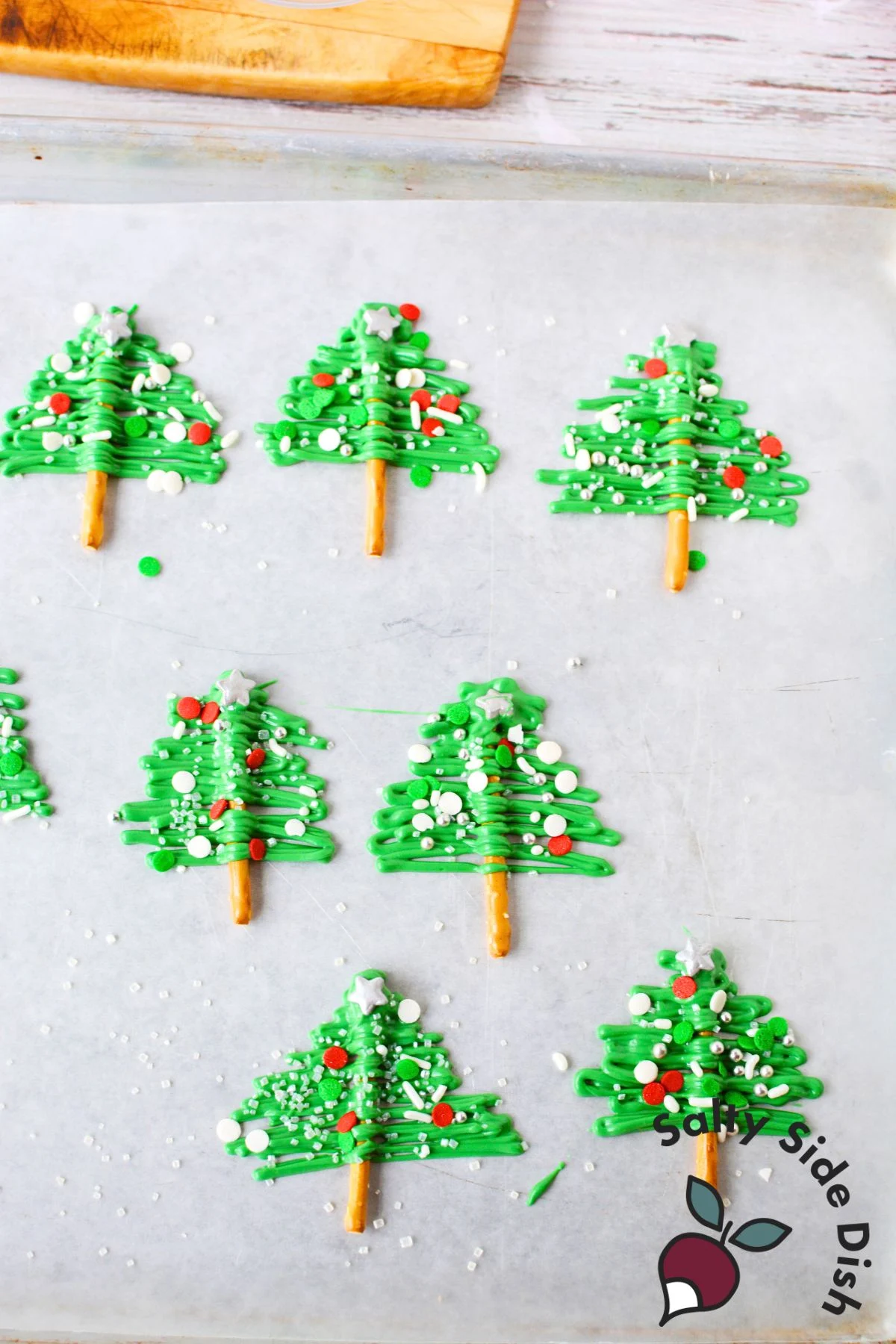 chocolate tree pretzels on parchment paper.