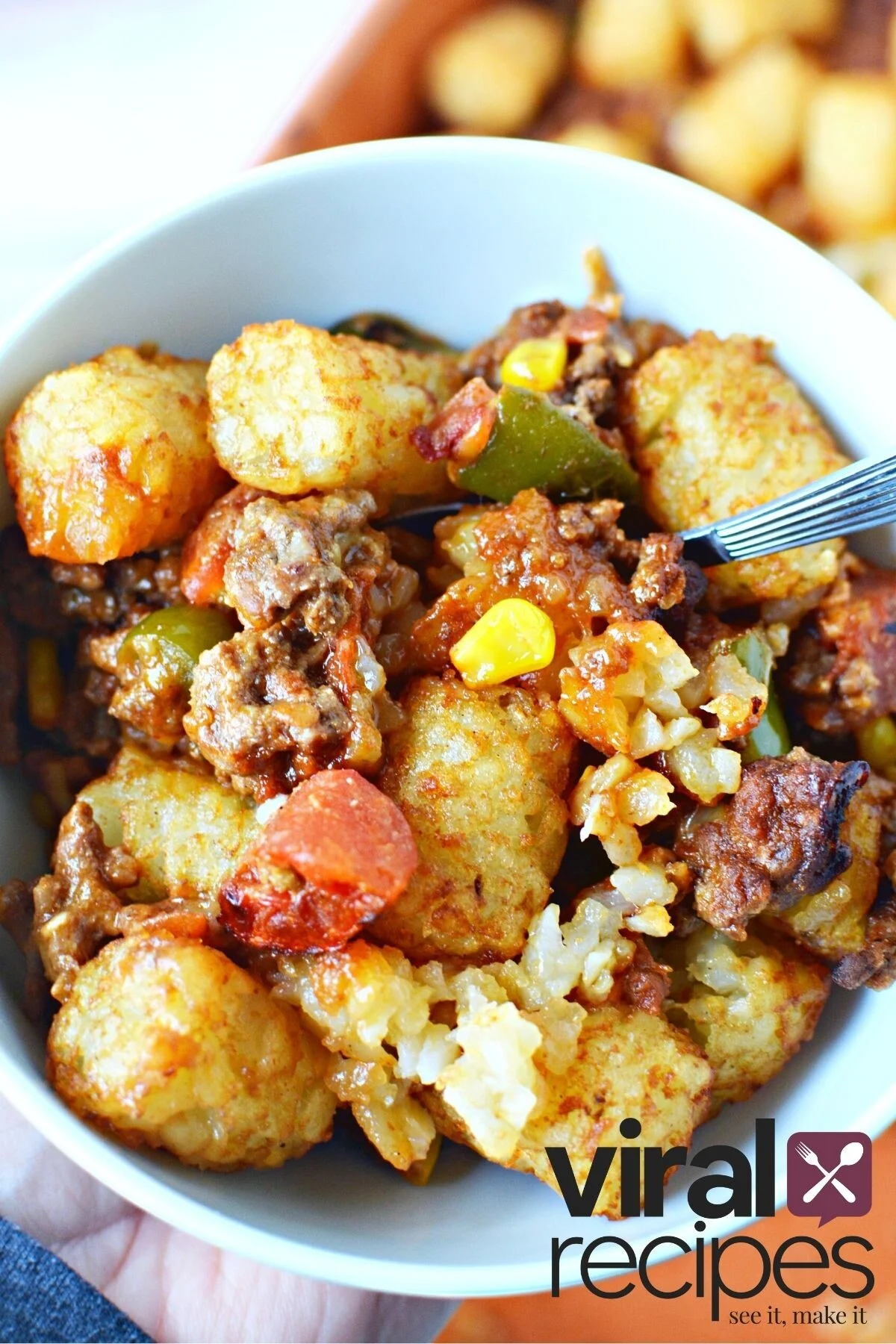 bowl of cowboy casserole with tater tots.