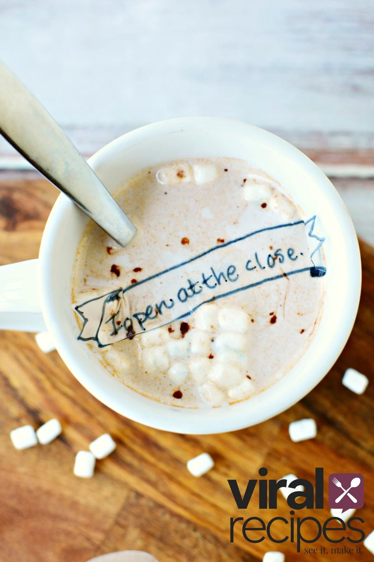 hot chocolate cocoa bomb message in glass.