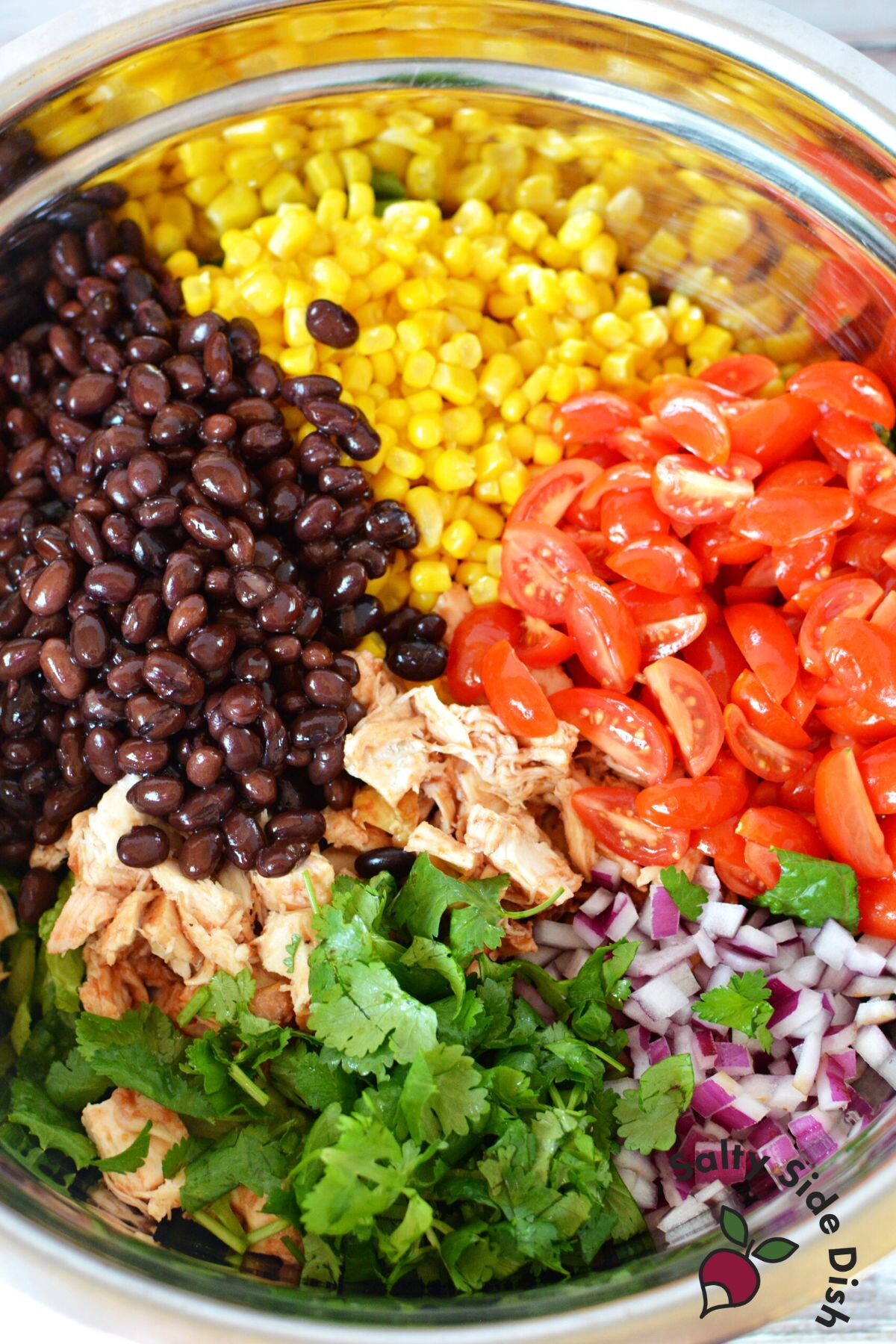 fresh salad ingredients in a bowl.