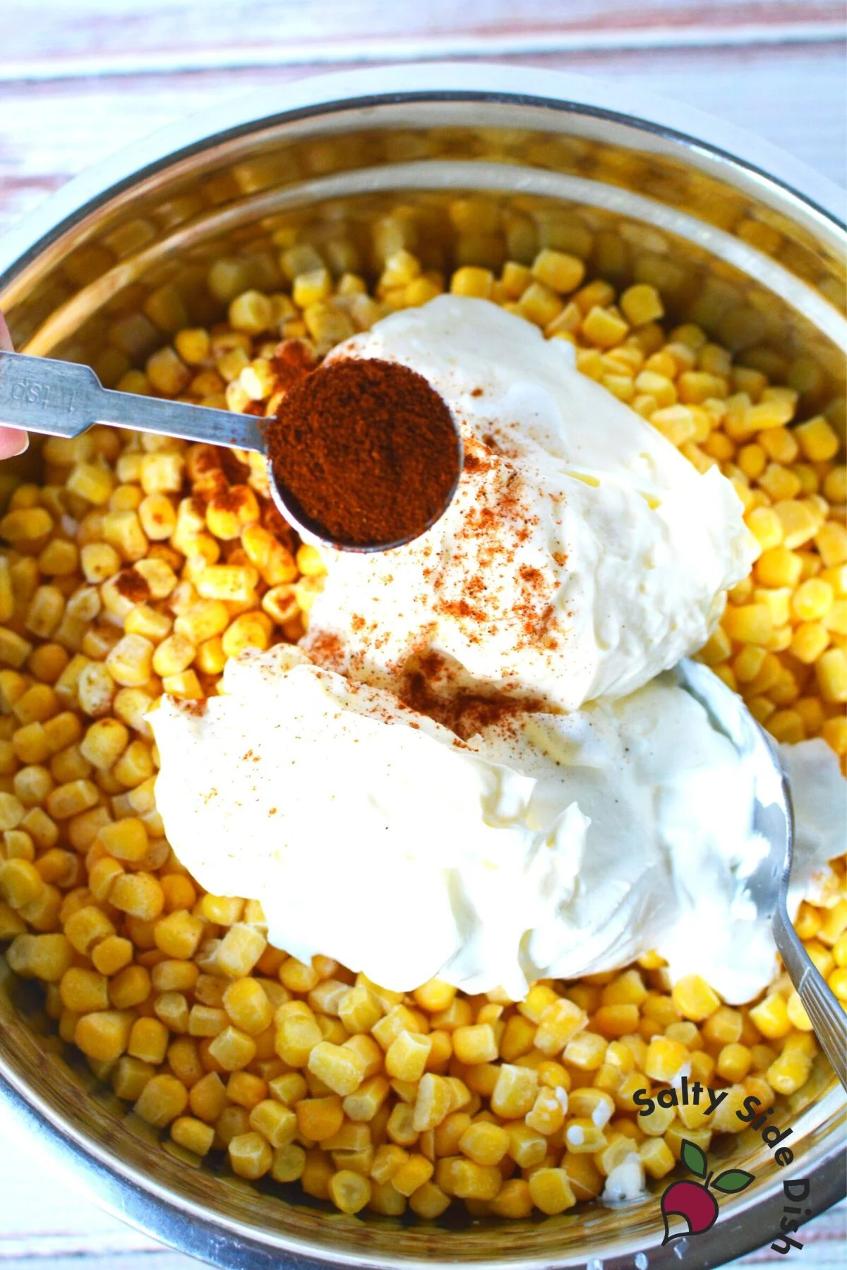 mixing ingredients in a bowl.