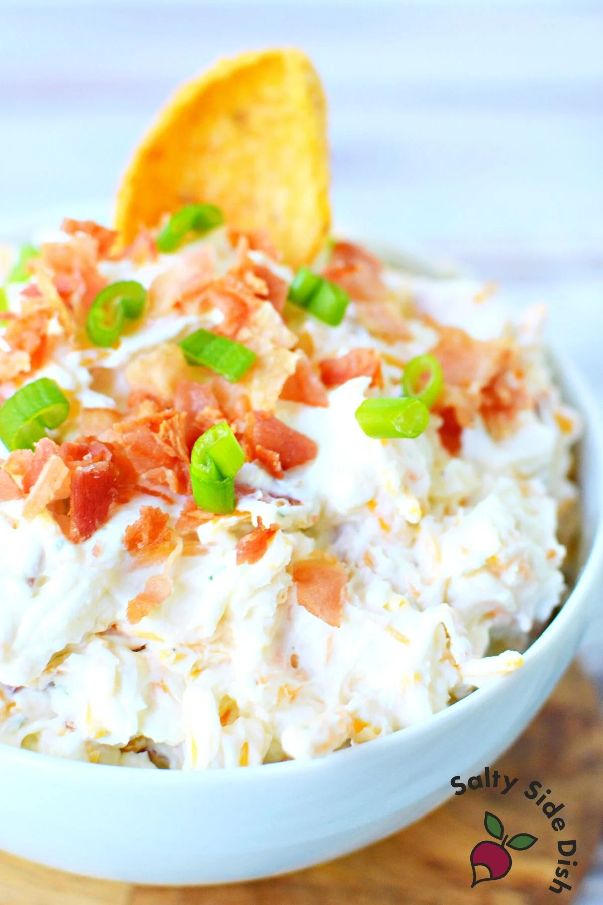 crack dip recipe in a bowl with chips.