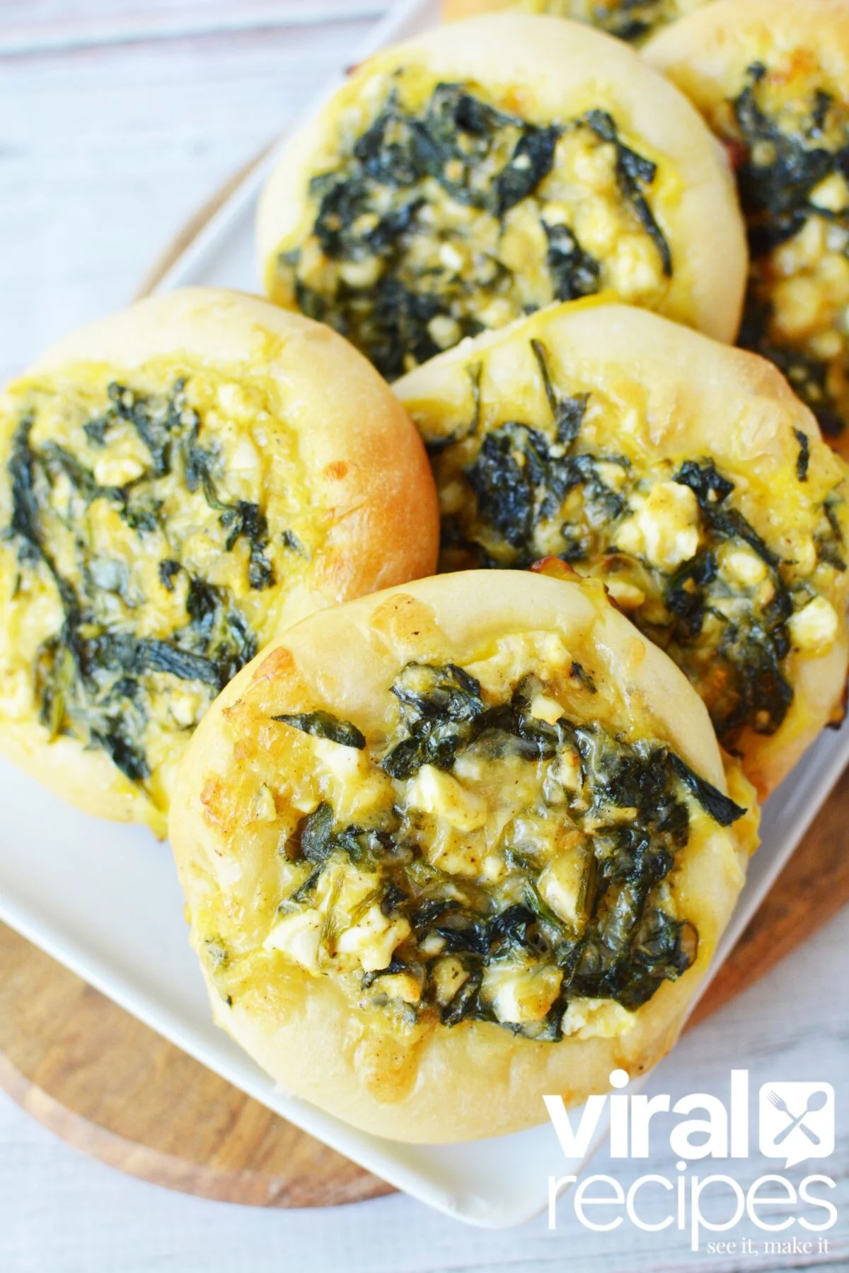 tiktok spinach pies recipe great for appetizer on a white plate.