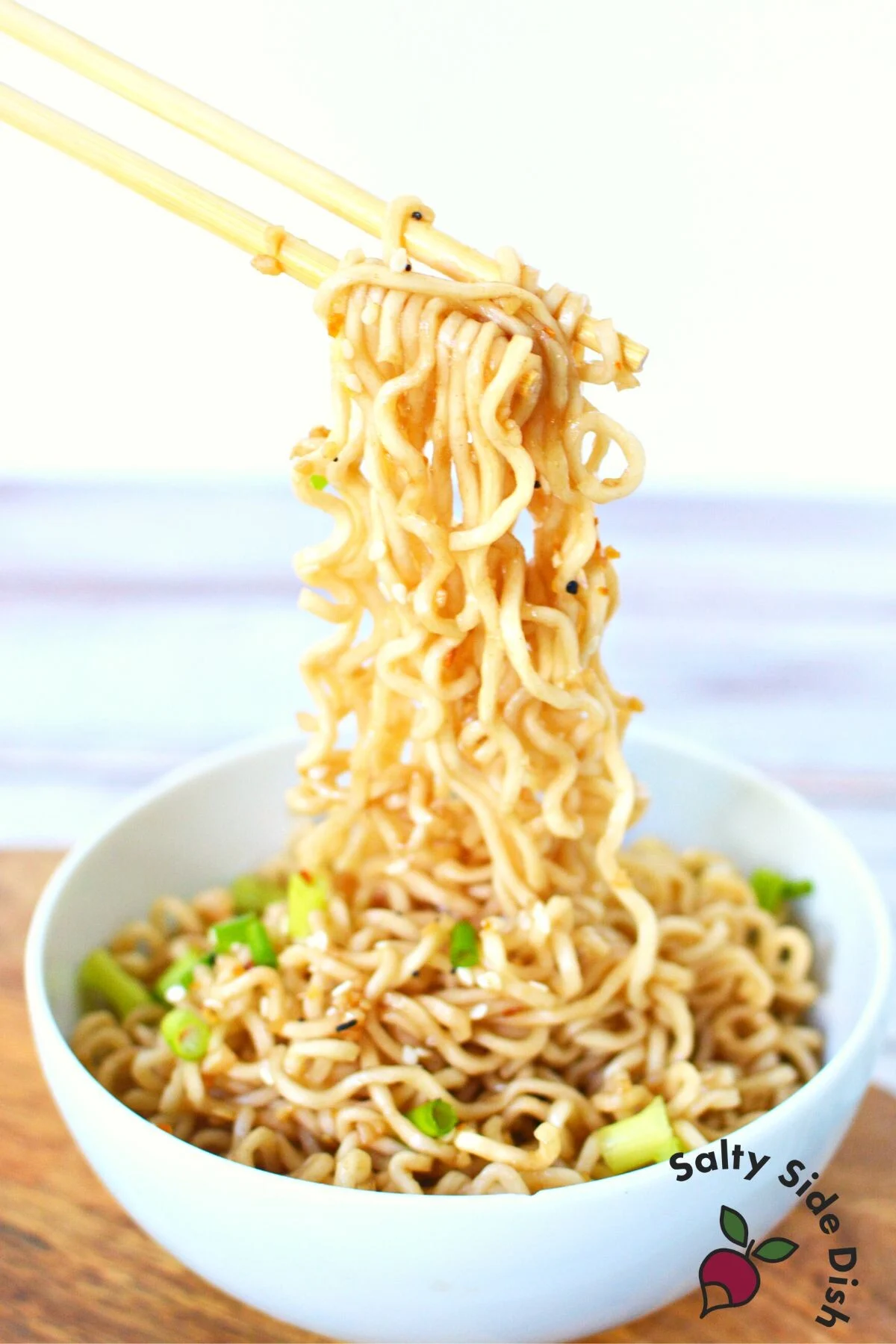 ramen noodle recipe on chop sticks.