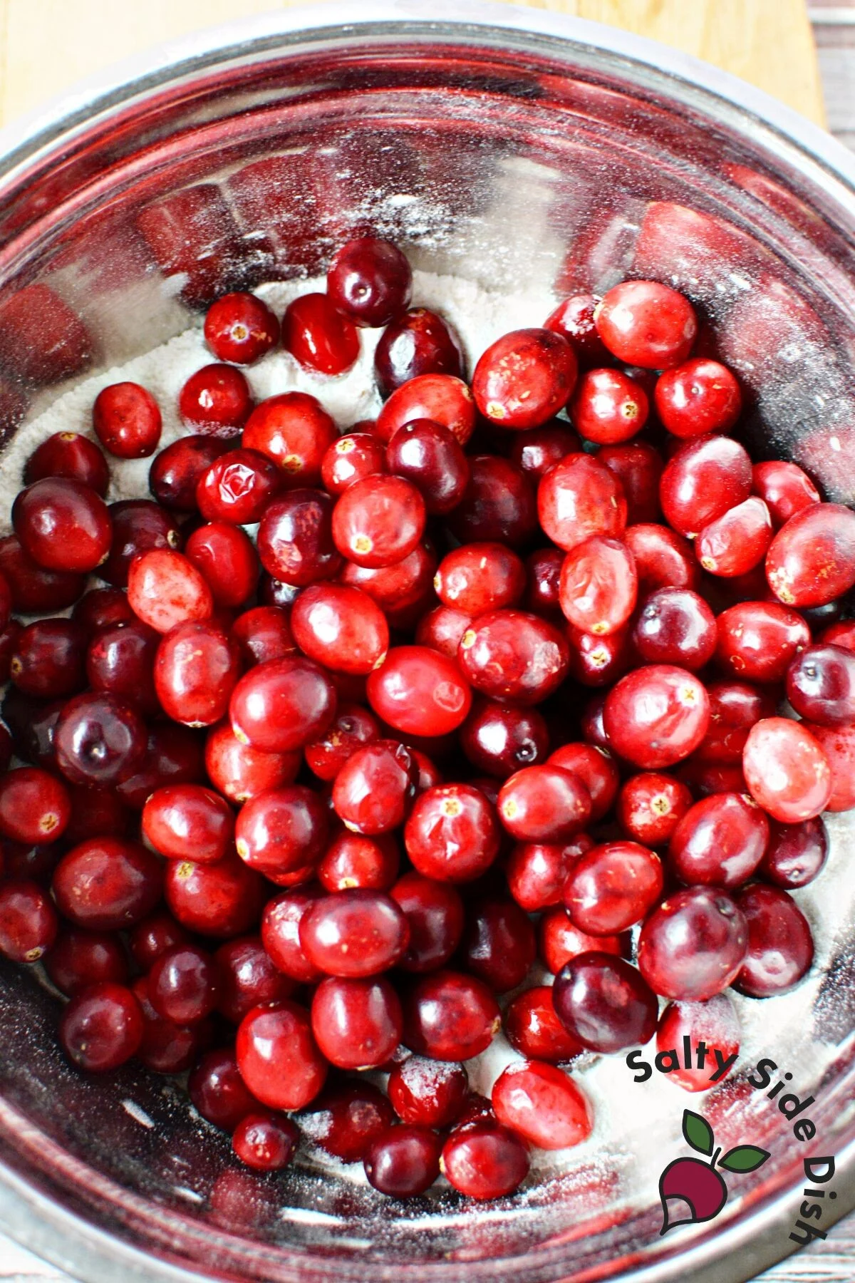 cranberries and sugar in bowl.