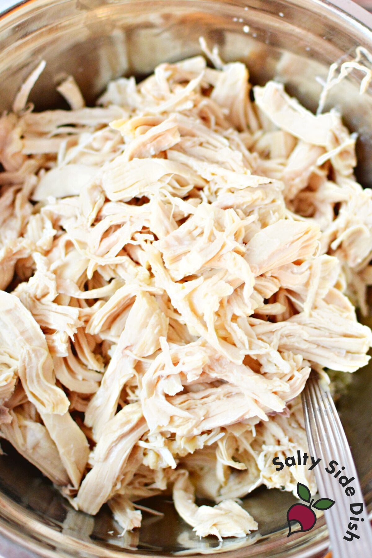 shredded chicken in a bowl.