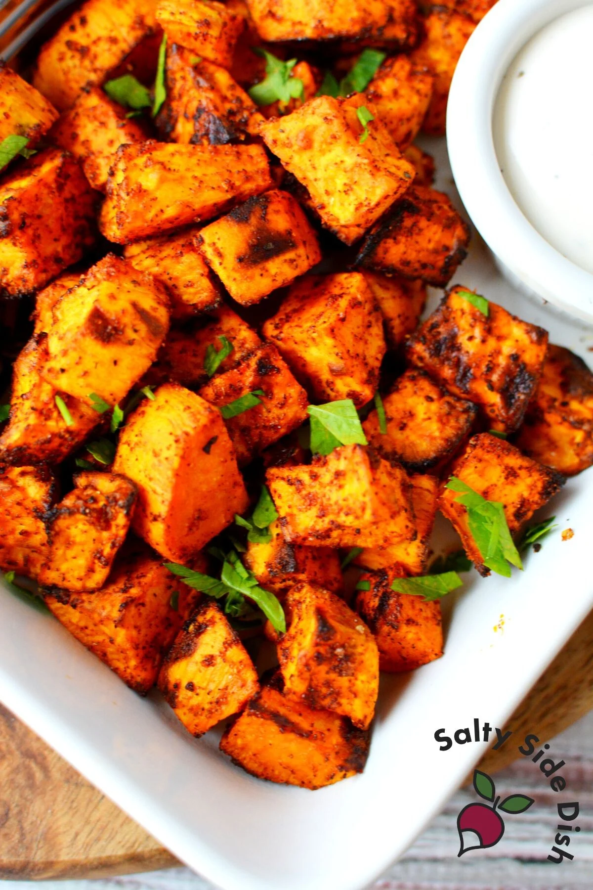 sweet potatoes in the air fryer on a plate and ready to eat.