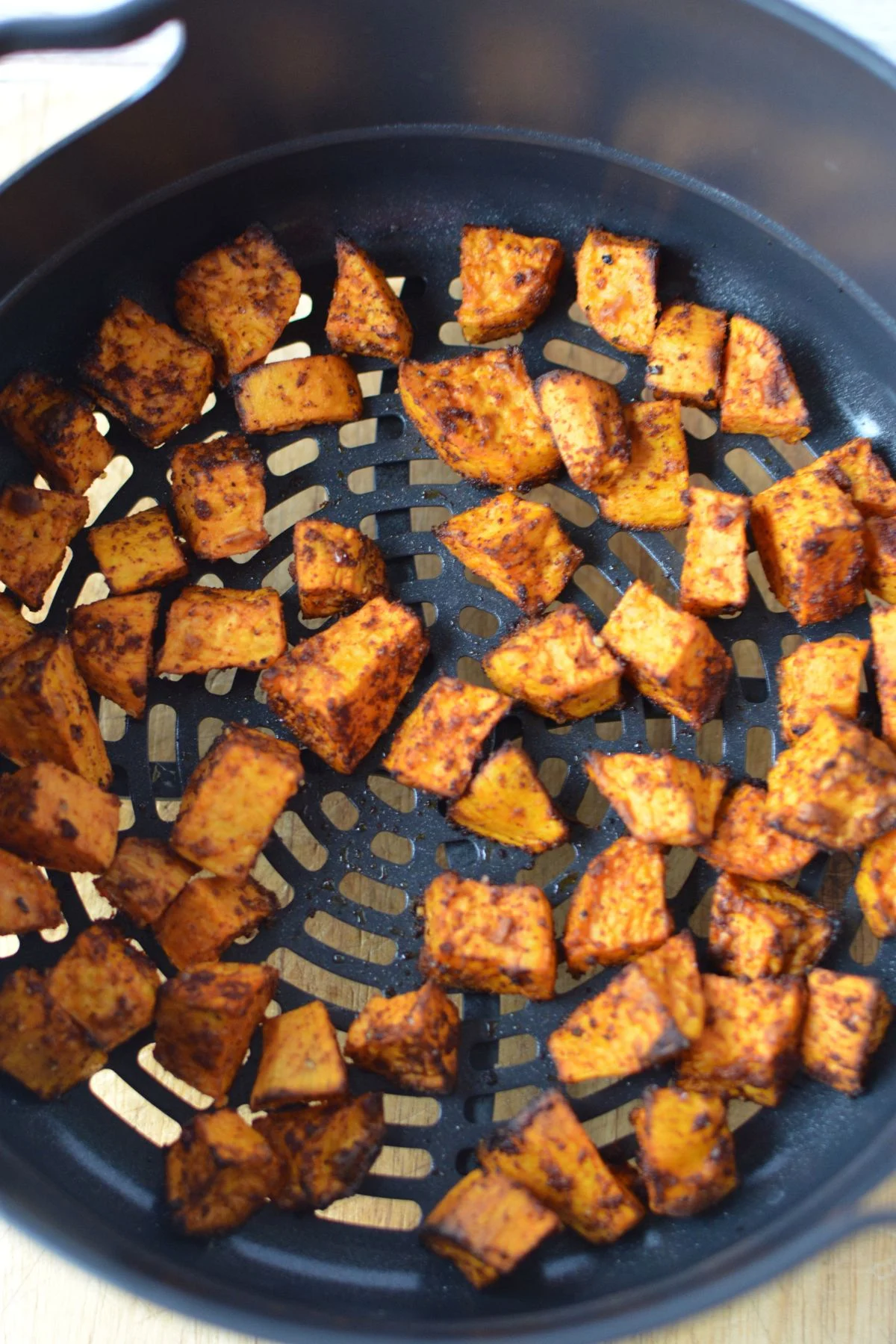 sweet potatoes in air crisp basket.
