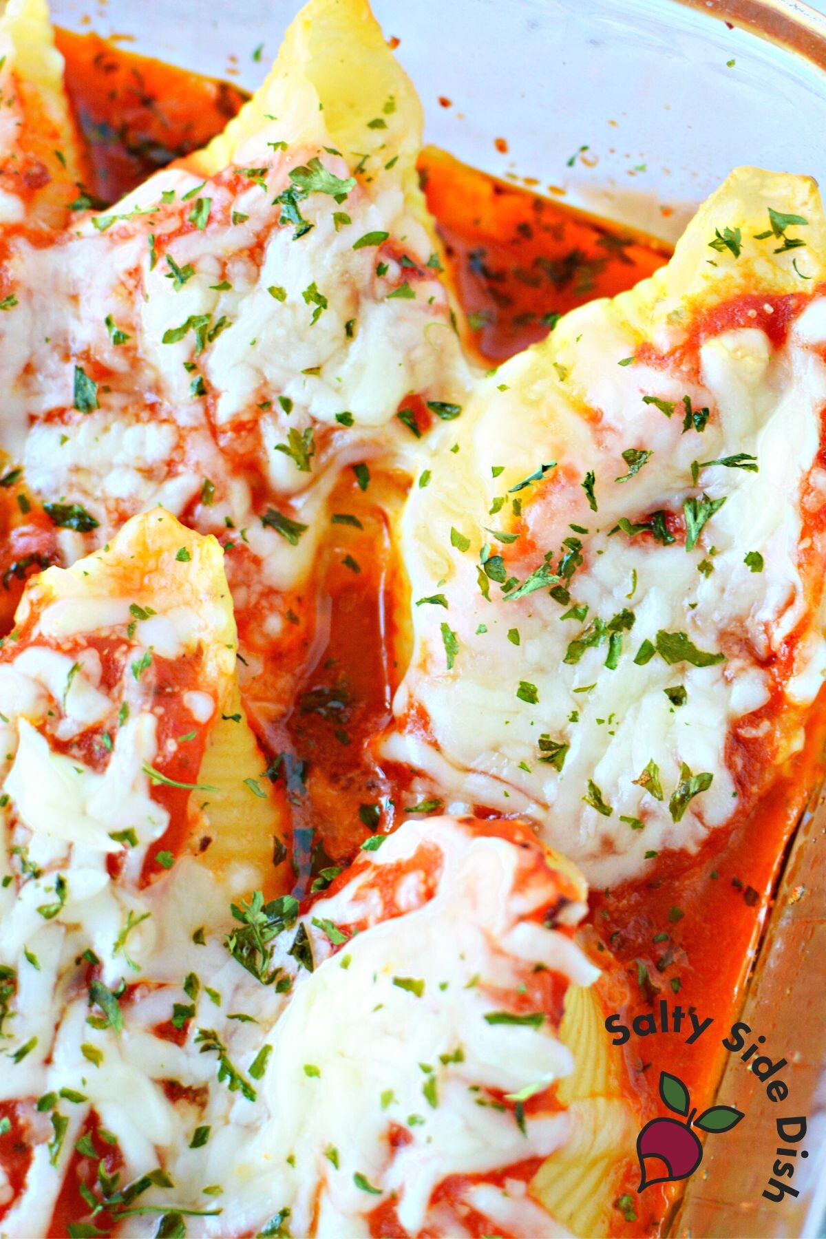 close up of cheesy stuffed shells.